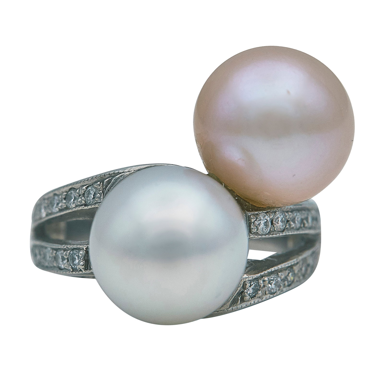 Platinum Pearl and Diamond Bypass Ring: METAL: Platinum; APPROXIMATE TOTAL DIAMOND WEIGHT: 0.24 ctw; GEMSTONES: Pearls approx. 11.00 mm in diameter; TESTED: Platinum; CONDITION: Pre-owned, Very Good; ITEM WEIGHT (GRAMS): 12.92 g; MEASUREMEN