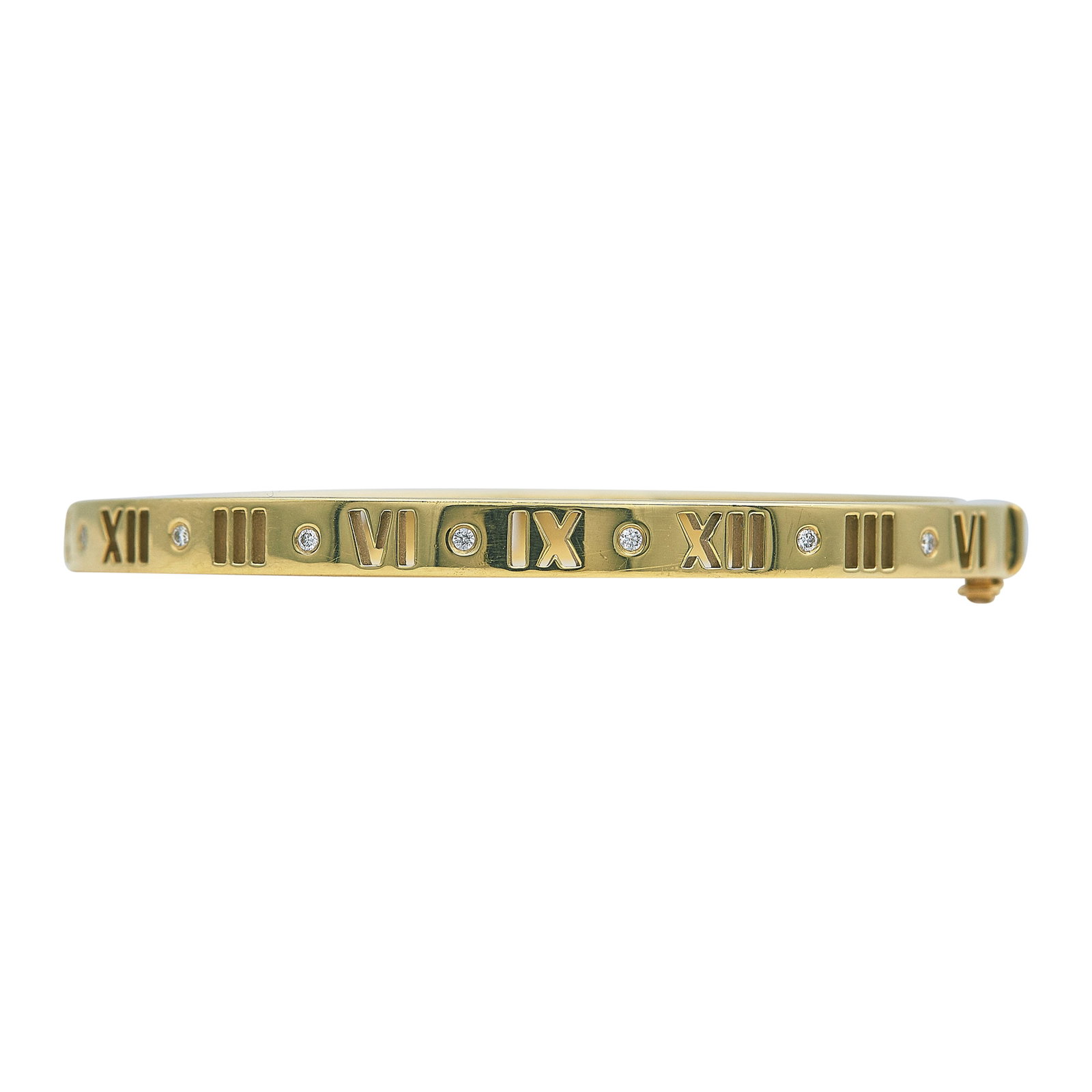 Tiffany & Co. Atlas 18K Yellow Gold and Diamond Hinged Bangle Bracelet: BRAND: Tiffany & Co.; COLLECTION: Atlas; METAL: 18K Yellow Gold; APPROXIMATE TOTAL DIAMOND WEIGHT: 0.14 ctw; STAMPED: © T & Co., Au750; CONDITION: Pre-owned, Good; ITEM WEIGHT (GRAMS): 30.7 g; MEASUR