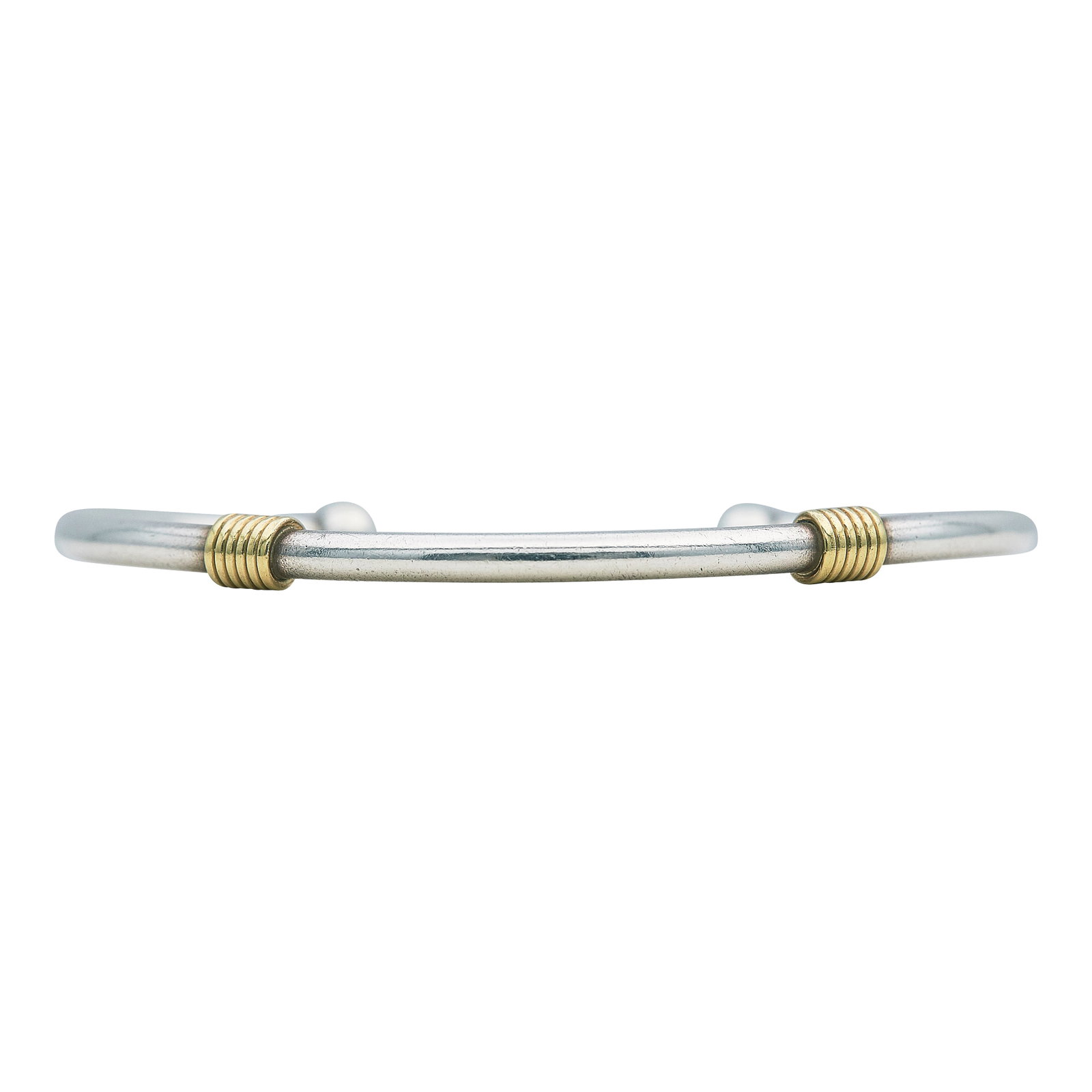 Tiffany & Co. Sterling Silver and 18K Yellow Gold Cuff Bracelet: BRAND: Tiffany & Co.; METAL: 18K Yellow Gold/Silver; STAMPED: Tiffany & Co., 925, 750; CONDITION: Pre-owned, Very Good; ITEM WEIGHT (GRAMS): 13.3 g; MEASUREMENTS: Interior width 2 3/8 inches