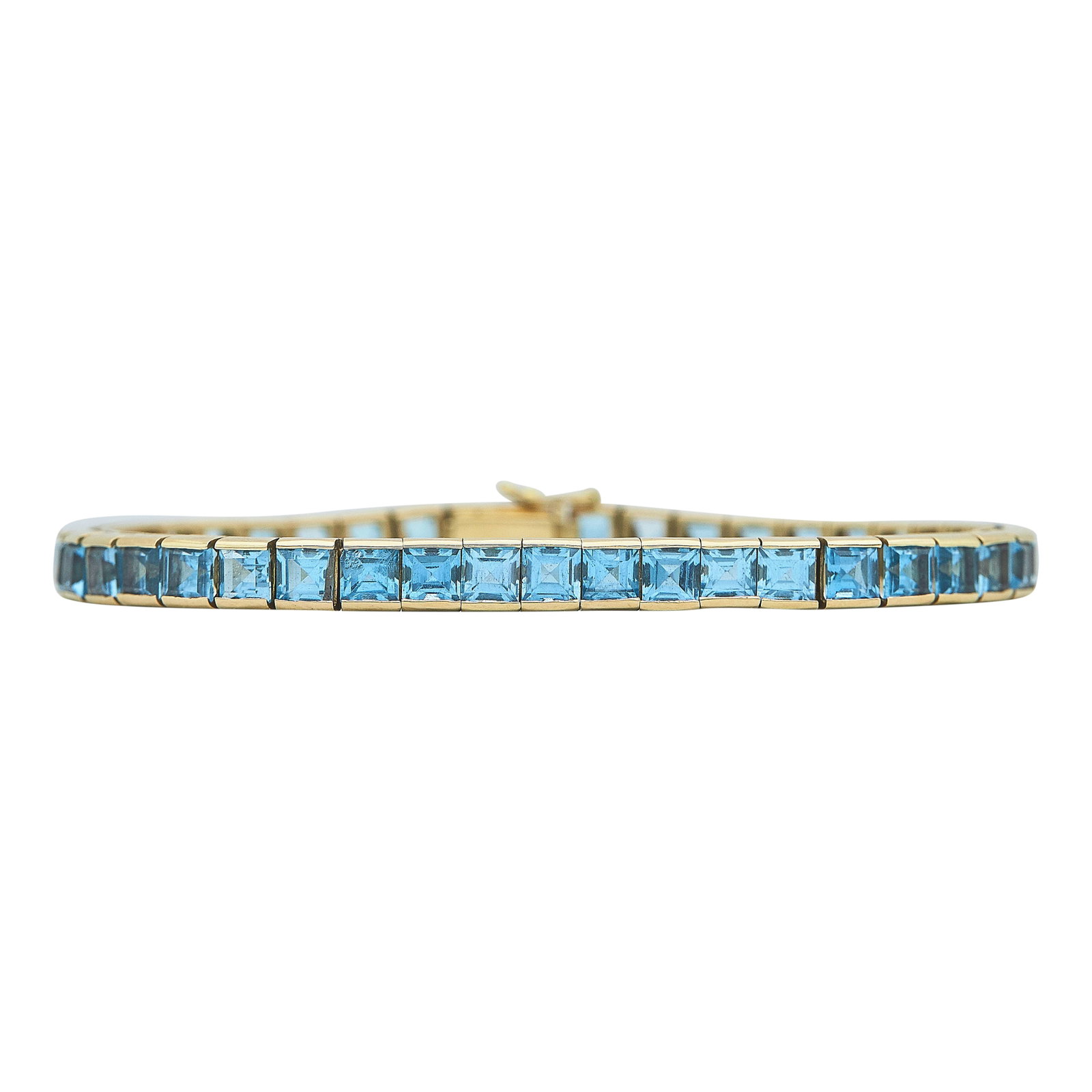 14K Yellow Gold and Blue Topaz Line Bracelet: METAL: 14K Yellow Gold; GEMSTONES: Blue Topaz, one stone with chip on pavilion; STAMPED: Maker's mark, 585; CONDITION: Pre-owned, Very Good; ITEM WEIGHT (GRAMS): 20.4 g; MEASUREMENTS: Bracelet 7 inche