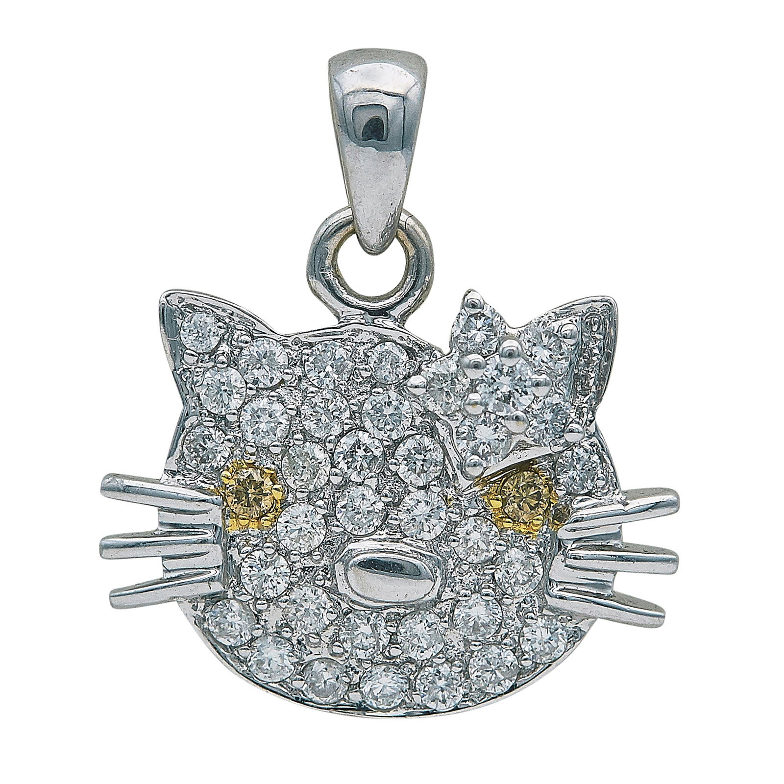 18K White Gold Diamond and Yellow Diamond Hello Kitty Pendant: METAL: 18K White Gold; APPROXIMATE TOTAL DIAMOND WEIGHT: 0.57 ctw; GEMSTONES: Yellow diamonds approx. total weight 0.03 carat; STAMPED: 060, 18K, 750, Maker's Mark; CONDITION: Pre-owned, Very Good; IT