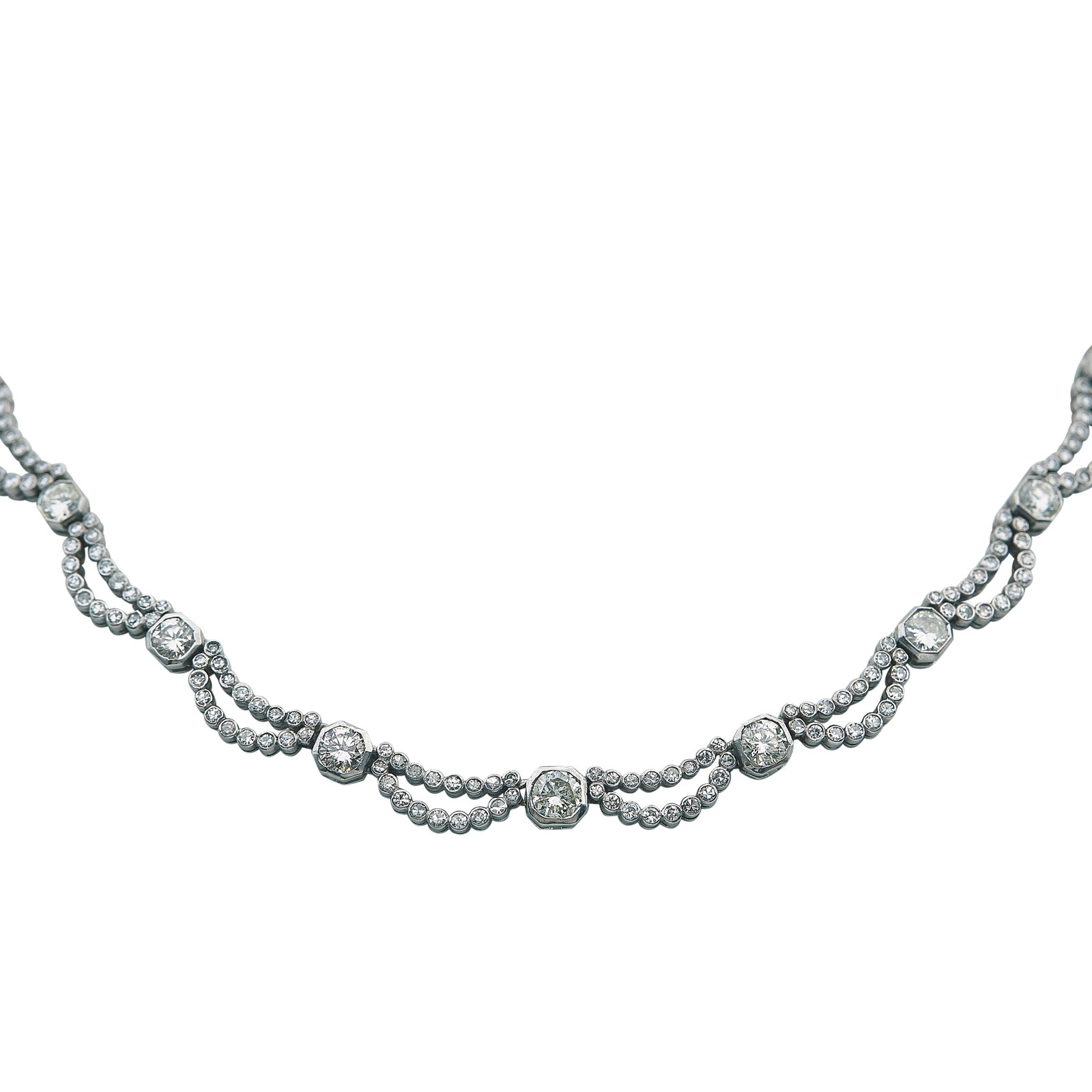 Platinum and 18K White Gold Diamond Collar Necklace: METAL: 18K White Gold, Platinum; APPROXIMATE TOTAL DIAMOND WEIGHT: 6.31 ctw; STAMPED: Maker's Mark, 750; TESTED: 18K White Gold, Platinum; CONDITION: Pre-owned, Very Good; ITEM WEIGHT (GRAMS): 33.2 g;