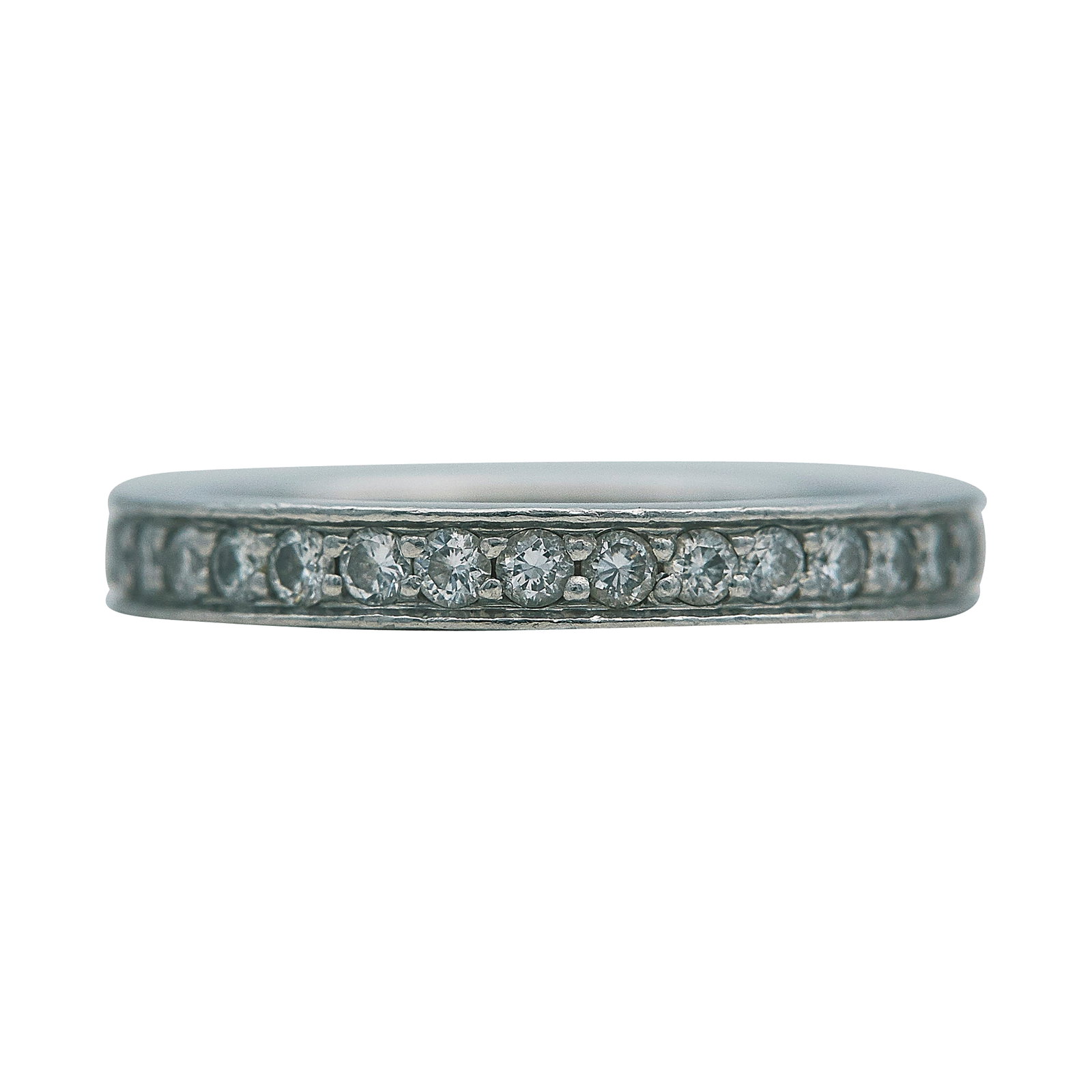 Cartier Platinum and Diamond Eternity Band Ring: BRAND: Cartier; METAL: Platinum; APPROXIMATE TOTAL DIAMOND WEIGHT: 0.66 ctw; APPROXIMATE DIAMOND COLOR(S): G; APPROXIMATE DIAMOND CLARITY: VS; STAMPED: © Cartier, 49, serial number, Pt950; CONDITION: