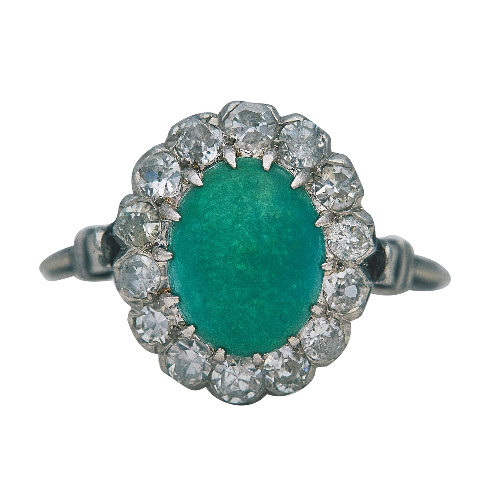 Platinum Green Cabochon Stone and Diamond Halo Ring: METAL: Platinum; APPROXIMATE TOTAL DIAMOND WEIGHT: 0.84 ctw; GEMSTONES: Green stone approx. 9.70 mm x 8.00 mm; TESTED: Platinum; CONDITION: Pre-owned, Good; ITEM WEIGHT (GRAMS): 5.1 g; MEASUREMENTS: R