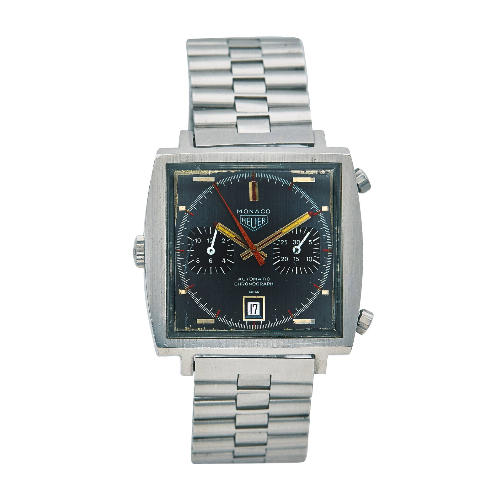 Heuer Monaco Stainless Steel Watch Ref. 1133G, circa 1975: BRAND: Heuer; STYLE: Monaco; REF. #: 1133G; CONDITION: Pre-owned, Good; YEAR: Circa 1975; ADDITIONAL COMMENTS: Scratches throughout watch, Scratches and abrasions throughout acrylic crystal, Dial with
