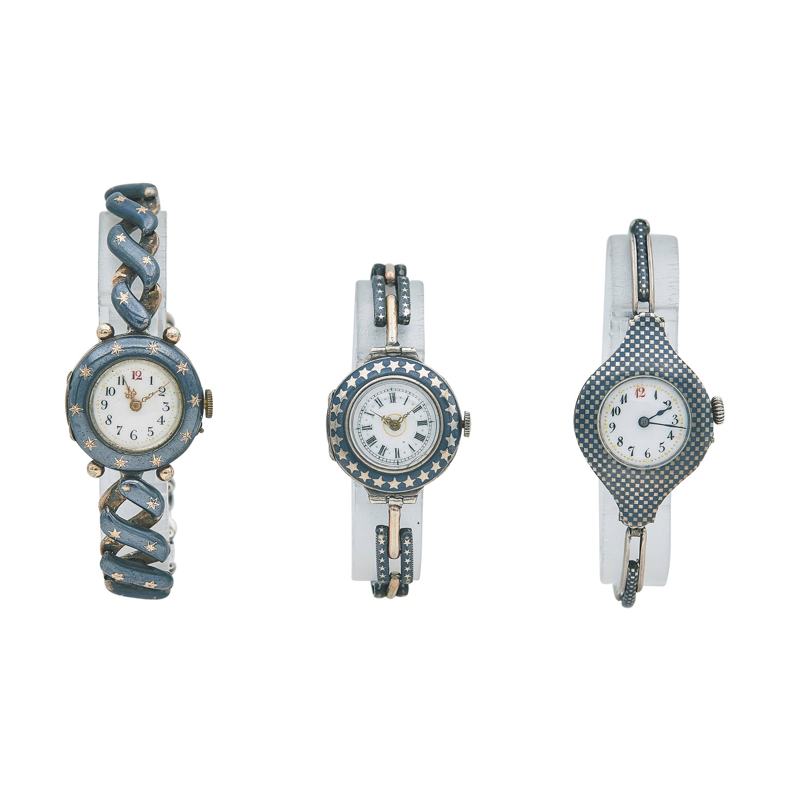 Set of Three Silver and NielloWristwatches Ref. Unknown, circa 1920: REF. #: Unknown; CONDITION: Pre-owned, Good; YEAR: Circa 1920; ADDITIONAL COMMENTS: Scratches throughout watches, Scratches and cracks throughout acrylic and glass crystals, Watches are decorative-Ser