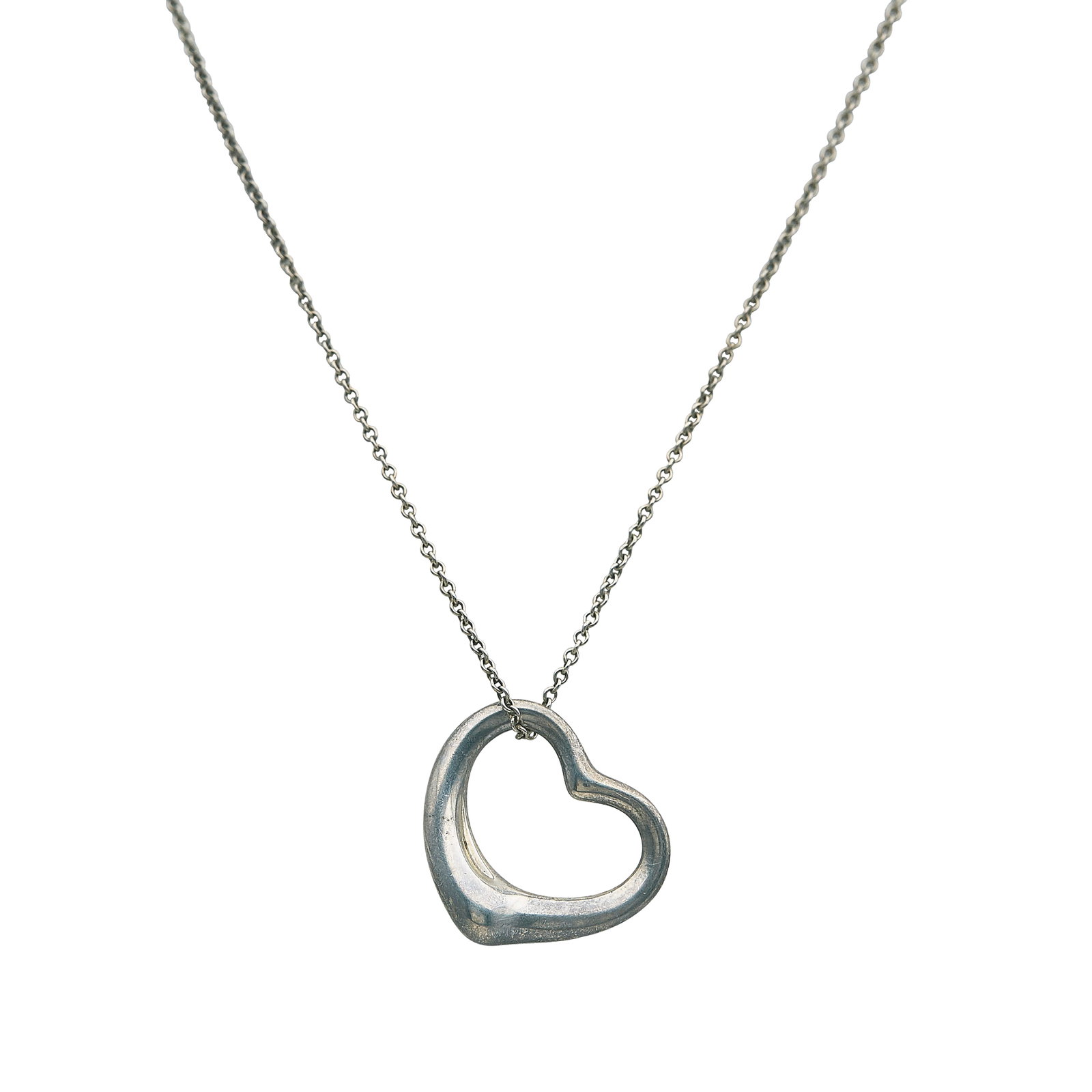 Elsa Peretti for Tiffany & Co. Sterling Silver Open Heart Pendant Necklace: BRAND: Elsa Peretti for Tiffany & Co.; METAL: Sterling Silver; STAMPED: Pendant marked: Tiffany & Co., © Elsa Peretti, 925, SPAIN; Chain marked: Peretti, Tiffany & Co. 925; CONDITION: Pre-owned, Good