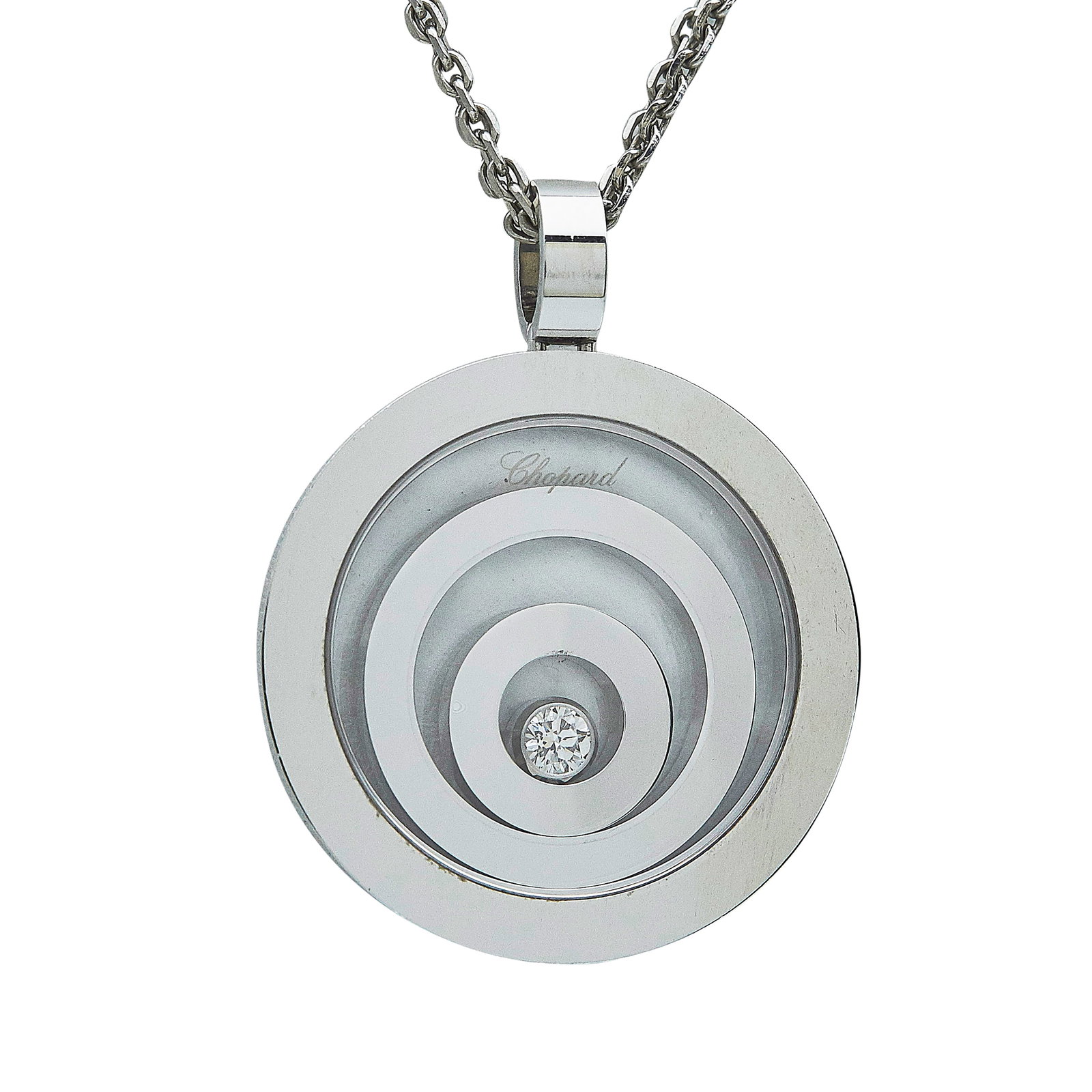 Chopard Happy Spirit 18K White Gold and Diamond Pendant Necklace: BRAND: Chopard; COLLECTION: Happy Spirit; METAL: 18K White Gold; APPROXIMATE TOTAL DIAMOND WEIGHT: 0.10 ctw; STAMPED: Chopard, Au750, serial number, 750, Swiss marks; CONDITION: Pre-owned, Very Good; 