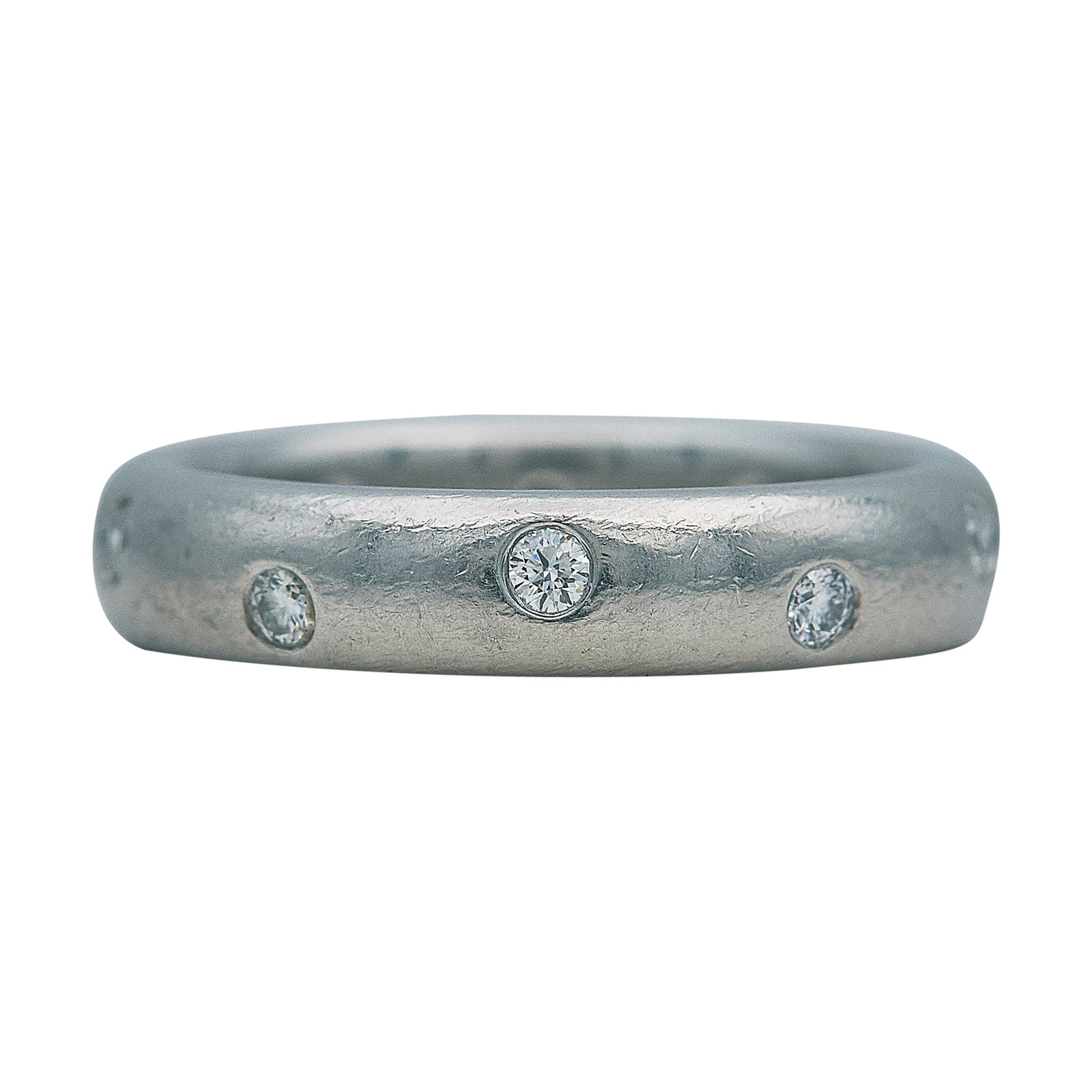 Tiffany & Co. Etoile Platinum and Diamond Band Ring: BRAND: Tiffany & Co.; COLLECTION: Etoile; METAL: Platinum; APPROXIMATE TOTAL DIAMOND WEIGHT: 0.30 ctw; STAMPED: ©, T&Co., PT950; CONDITION: Pre-owned, Good; ITEM WEIGHT (GRAMS): 8.5 g; MEASUREMENTS: 