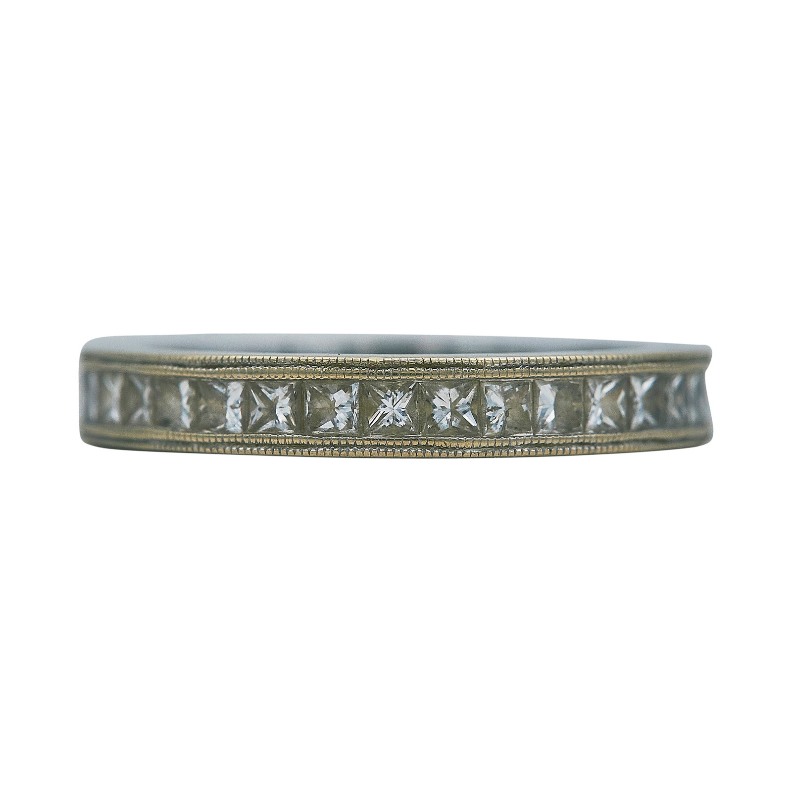 18K White Gold and Princess Cut Diamond Eternity Band Ring: METAL: 18K White Gold; APPROXIMATE TOTAL DIAMOND WEIGHT: 1.40 ctw; STAMPED: Maker's Mark, D137; CONDITION: Pre-owned, Good; ITEM WEIGHT (GRAMS): 3.8 g; MEASUREMENTS: Ring size 6 1/2