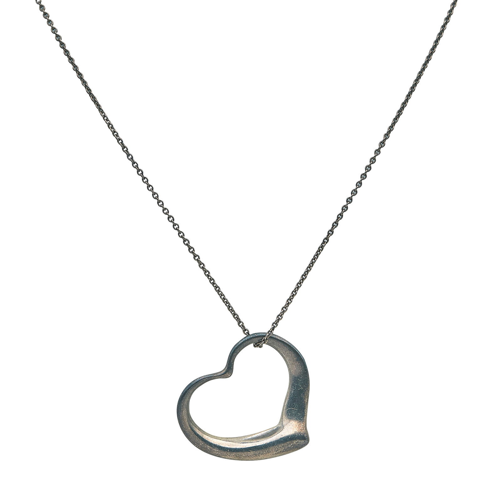 Elsa Peretti for Tiffany & Co. Open Heart Sterling Silver Pendant Necklace: BRAND: Elsa Peretti for Tiffany & Co.; COLLECTION: Open Heart; METAL: Sterling Silver; STAMPED: Clasp marked: Tiffany & Co., Peretti; Pendant marked: © Tiffany & Co. Sterling , Peretti; CONDITION: Pr
