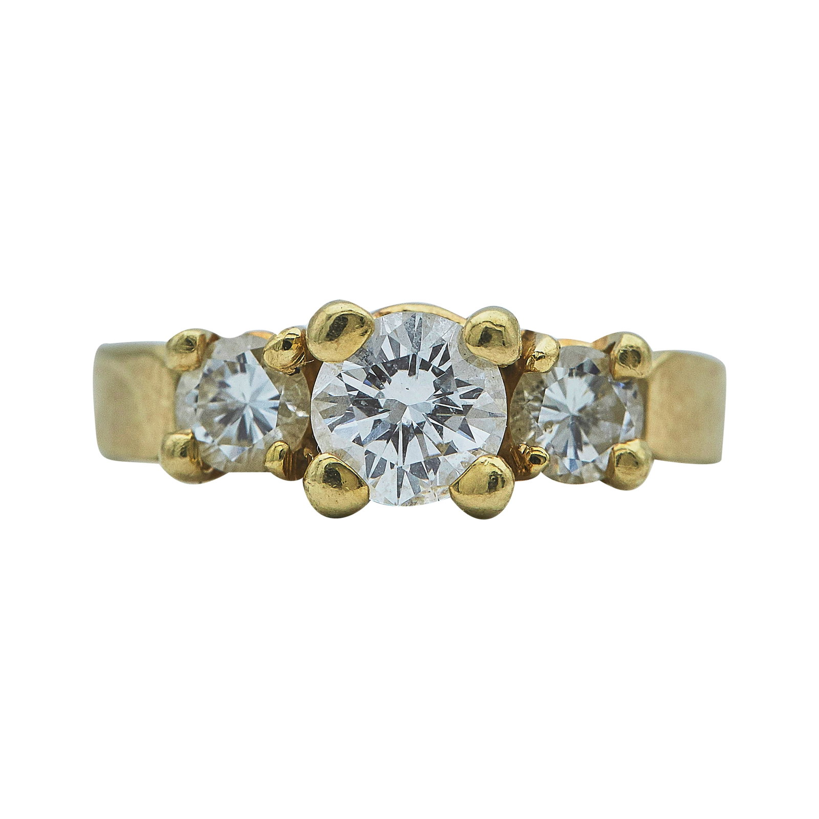 14K Yellow Gold and Diamond Three Stone Engagement Ring: METAL: 14K Yellow Gold; APPROXIMATE TOTAL DIAMOND WEIGHT: 1.25 ctw; STAMPED: 14K, rubbed mark; CONDITION: Pre-owned, Very Good; ITEM WEIGHT (GRAMS): 4.6 g; MEASUREMENTS: Ring size 6 1/2