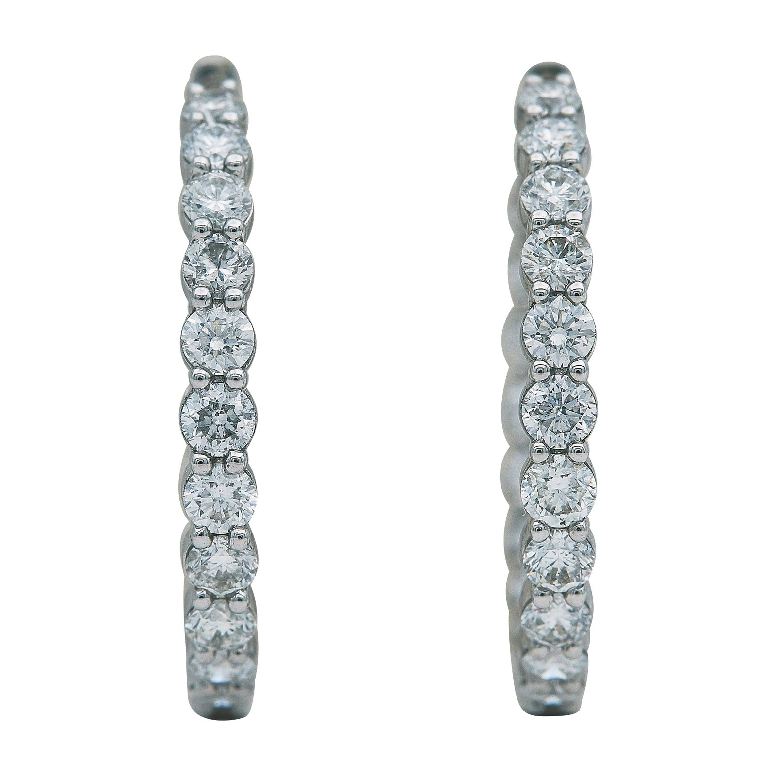 14K White Gold and Diamond Inside Out Hoop Earrings: METAL: 14K White Gold; APPROXIMATE TOTAL DIAMOND WEIGHT: 3.80 ctw; TESTED: 14K White Gold; CONDITION: Pre-owned, Very Good; ITEM WEIGHT (GRAMS): 8.5 g; MEASUREMENTS: Earrings 1 1/8 inch in diameter; A