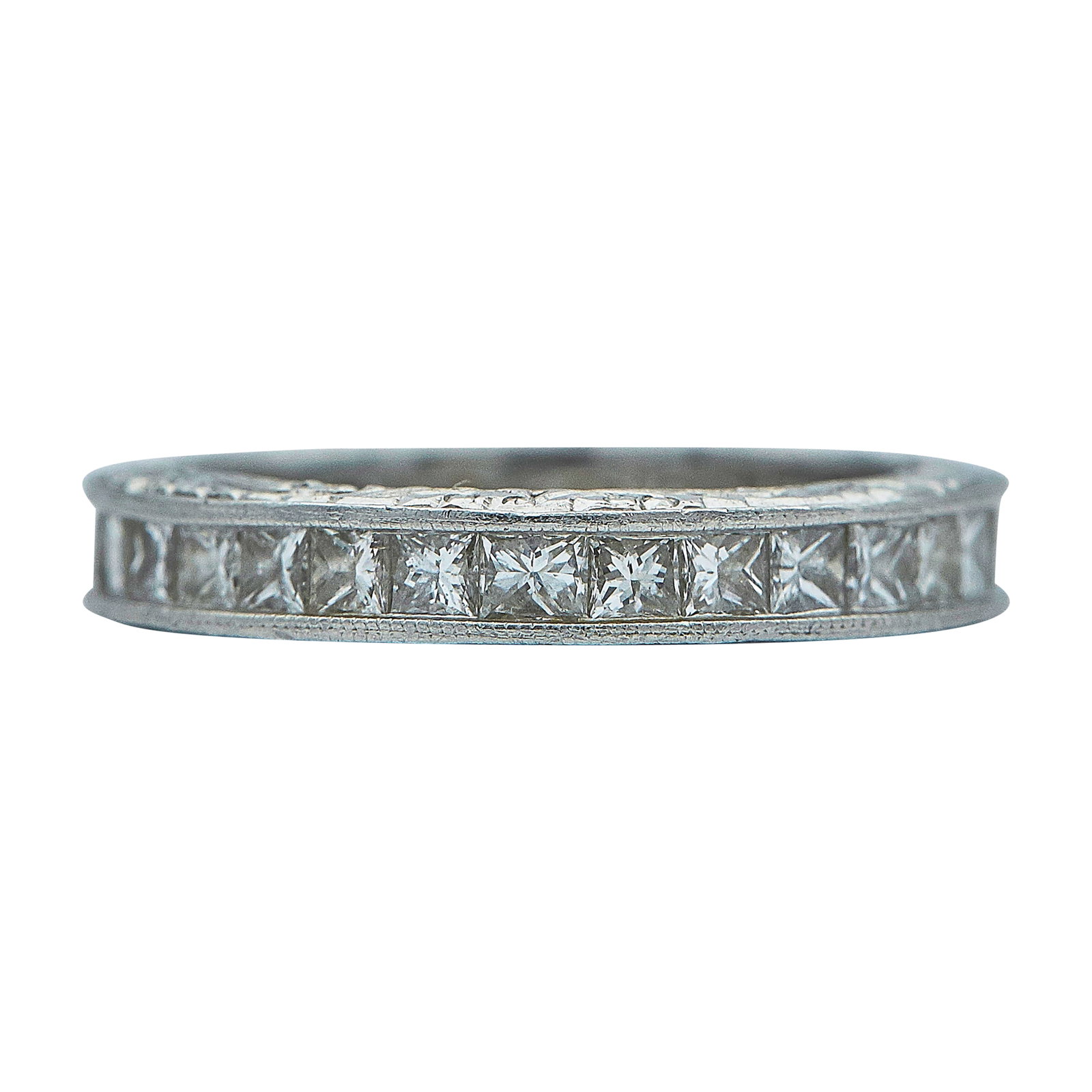 Platinum and Channel Set Diamond Eternity Band Ring: METAL: Platinum; APPROXIMATE TOTAL DIAMOND WEIGHT: 1.80 ctw; STAMPED: Plat; CONDITION: Pre-owned, Good; ITEM WEIGHT (GRAMS): 4.8 g; MEASUREMENTS: Ring size 4 1/2