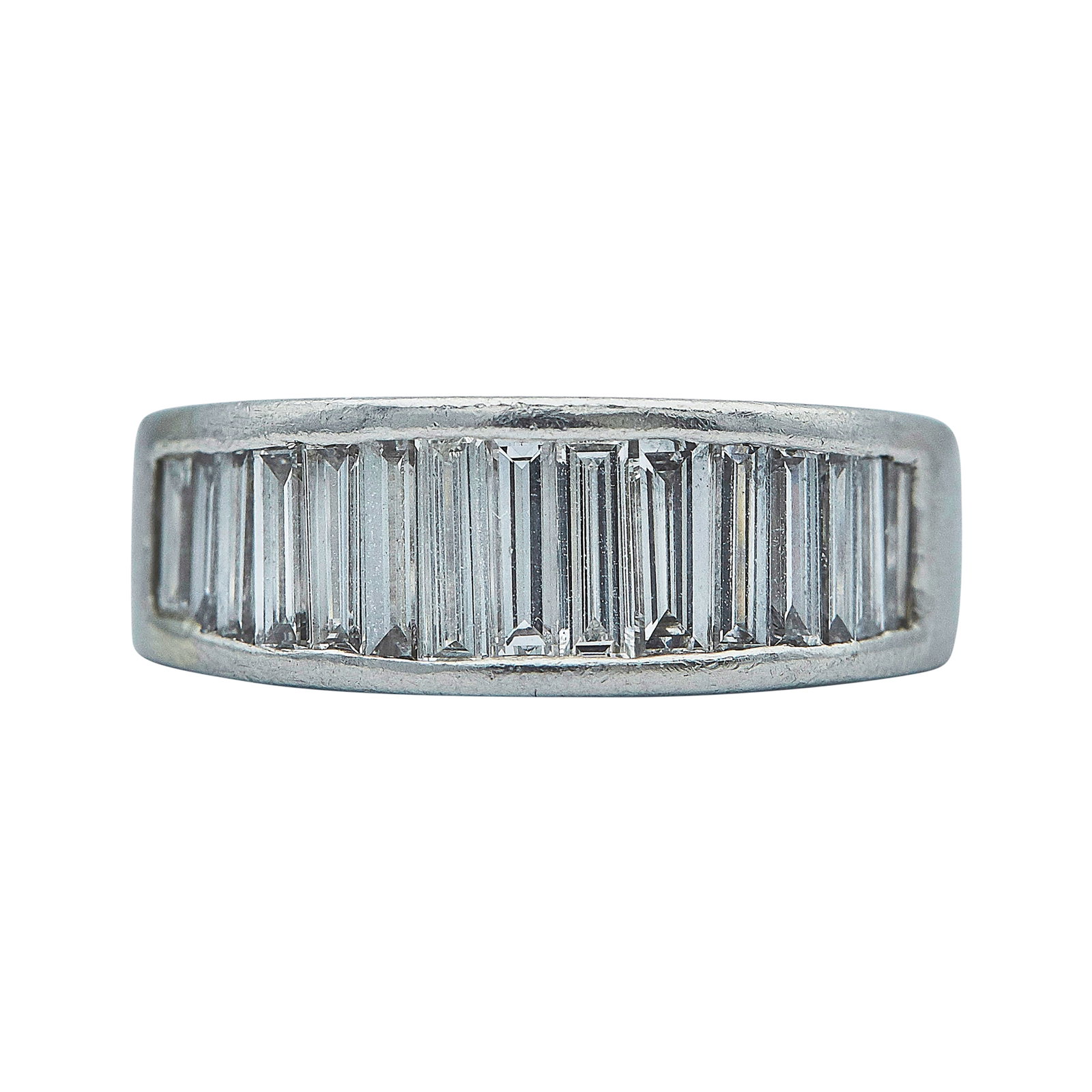 Platinum and Channel Set Baguette Cut Diamond Band Ring: METAL: Platinum; APPROXIMATE TOTAL DIAMOND WEIGHT: 1.52 ctw; STAMPED: D1.52, AT, LAST, Pt900; CONDITION: Pre-owned, Good; ITEM WEIGHT (GRAMS): 9.8 g; MEASUREMENTS: Ring size 6 3/4