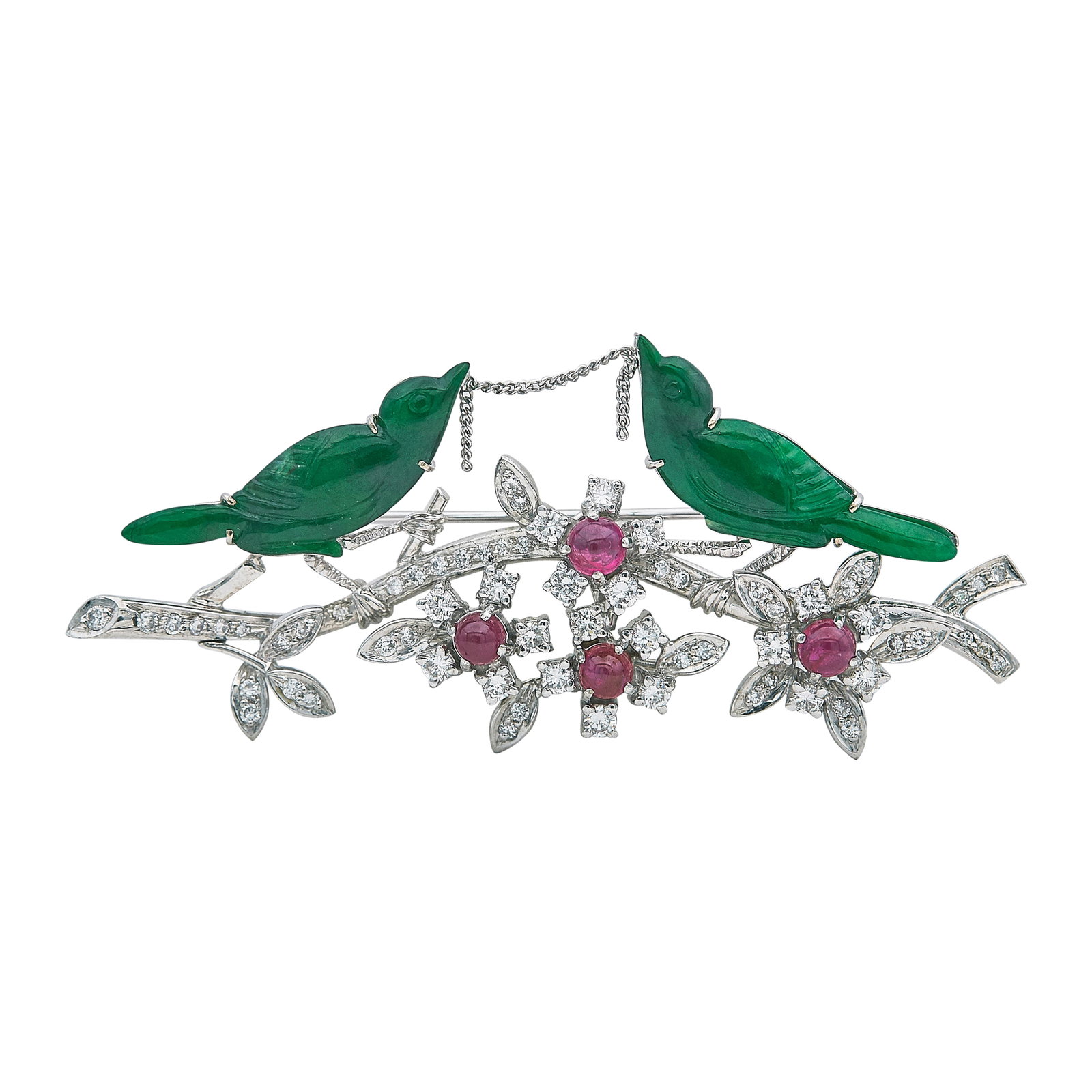 18K White Gold Jade, Diamond, and Ruby Birds Brooch: METAL: 18K White Gold; APPROXIMATE TOTAL DIAMOND WEIGHT: 1.05 ctw; GEMSTONES: Jade, Ruby; STAMPED: 750, 18K; CONDITION: Pre-owned, Very Good; ITEM WEIGHT (GRAMS): 15.2 g; MEASUREMENTS: Brooch 2 1/2 in