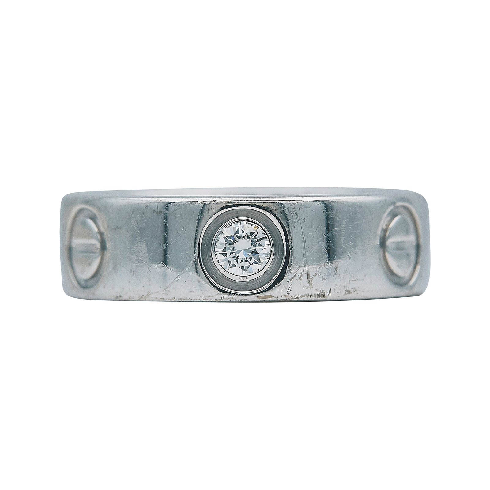 Cartier Love Classic Model 18K White Gold and Diamond Band Ring: BRAND: Cartier; COLLECTION: Love; METAL: 18K White Gold; APPROXIMATE TOTAL DIAMOND WEIGHT: 0.18 ctw; STAMPED: Cartier, 750, © 49, Serial number, Swiss marks; TESTED: 18K White Gold; CONDITION: Pre-ow