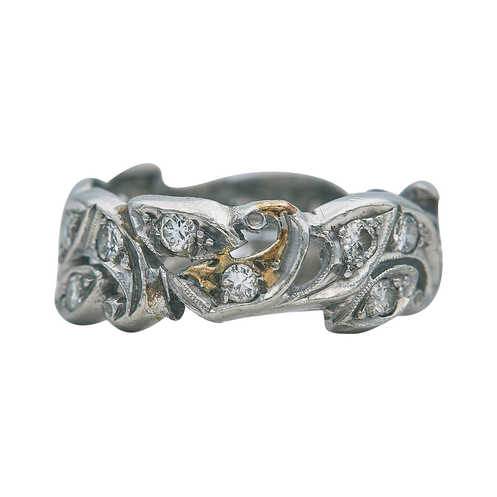 Platinum and Diamond Floral Band Ring: METAL: Platinum; APPROXIMATE TOTAL DIAMOND WEIGHT: 0.51 ctw; TESTED: Platinum; CONDITION: Pre-owned, Good; ITEM WEIGHT (GRAMS): 3.7 g; MEASUREMENTS: Ring size 7; ADDITIONAL COMMENTS: Evidence of old s