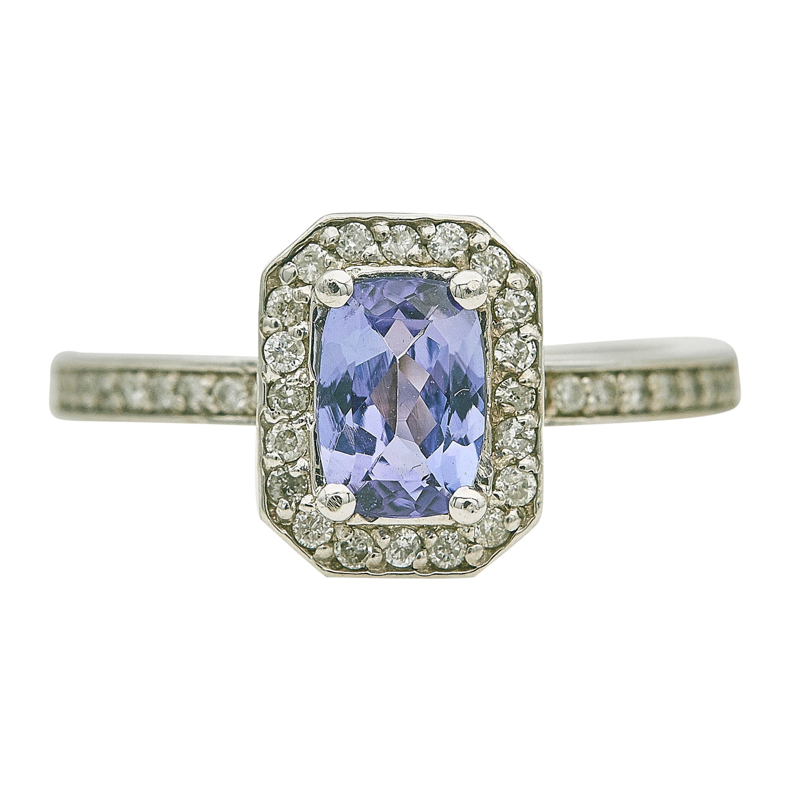 14K White Gold Cushion Cut Iolite and Diamond Ring: METAL: 14K White Gold; APPROXIMATE TOTAL DIAMOND WEIGHT: 0.40 ctw; GEMSTONES: Cushion cut iolite approx. 7.00 x 5.00 mm; STAMPED: 14K; CONDITION: Pre-owned, Very Good; ITEM WEIGHT (GRAMS): 4.4 g; MEAS