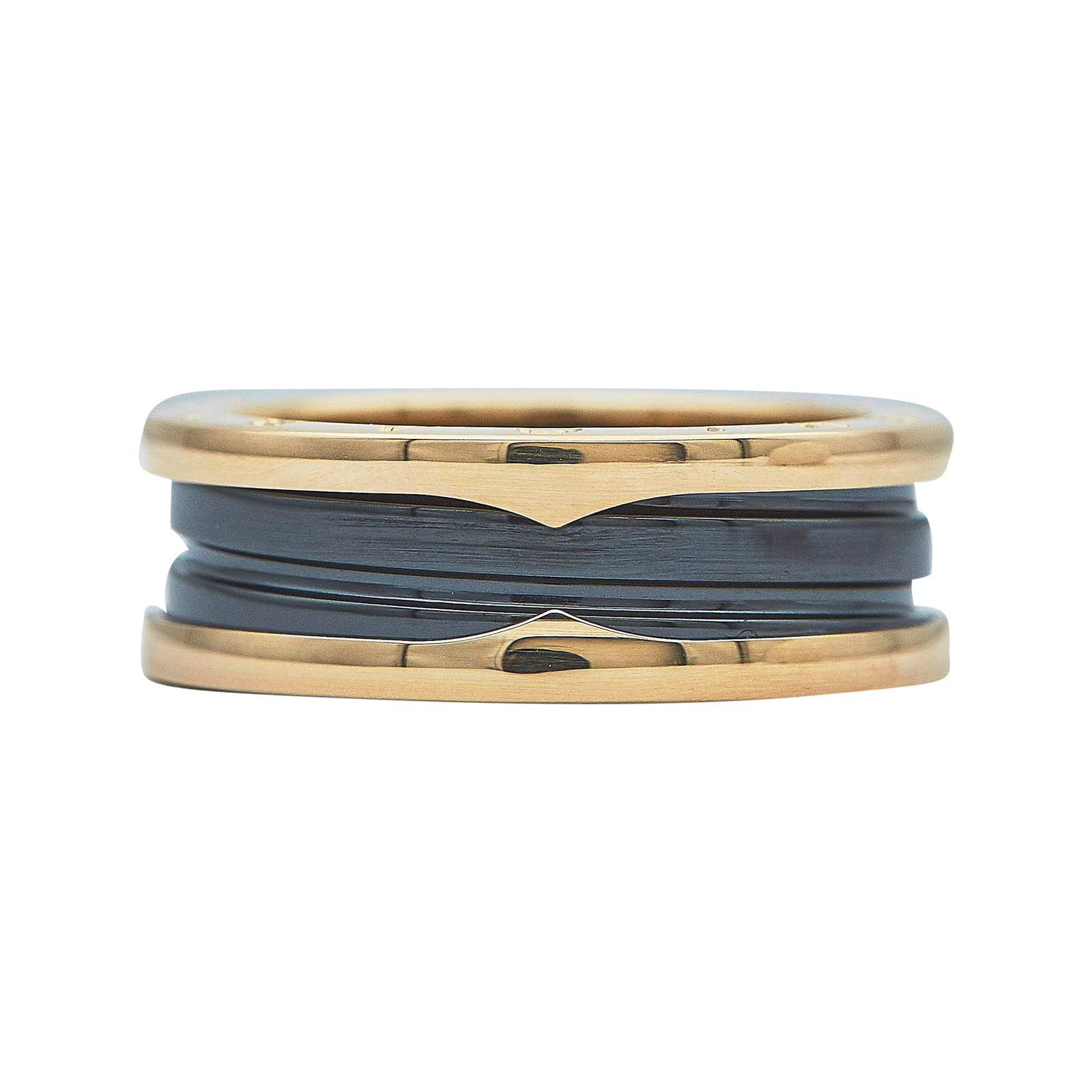 Bulgari Bvlgari B.zero1 18K Rose Gold and Bronze Ceramic Band Ring: BRAND: Bulgari; COLLECTION: B.zero1; METAL: 18K Rose Gold, Ceramic; STAMPED: Bvlgari, serial number, Au750, Italian workshop mark, Made in Italy, 63; CONDITION: Pre-owned, Very Good; ITEM WEIGHT (GRAM
