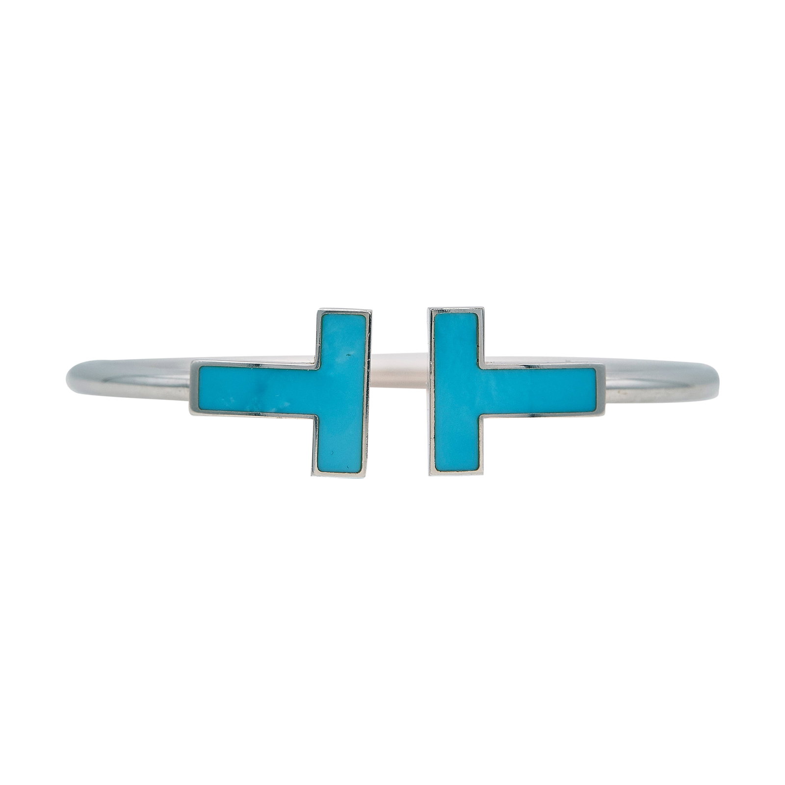 Tiffany & Co. Tiffany T 18K White Gold and Turquoise Cuff Bracelet: BRAND: Tiffany & Co.; COLLECTION: Tiffany T; METAL: 18K White Gold; GEMSTONES: Turquoise; STAMPED: © T&Co., Au 750, Italy; CONDITION: Pre-owned, Very Good; ITEM WEIGHT (GRAMS): 15.4 g; MEASUREMENTS: 