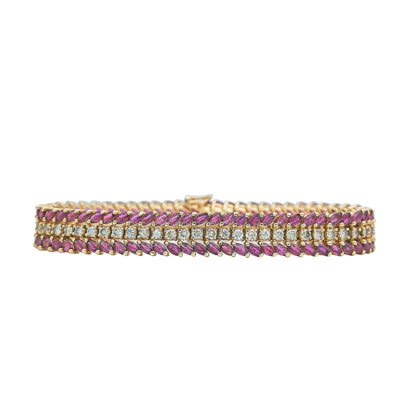 14K Yellow Gold Ruby and Diamond Link Bracelet: METAL: 14K Yellow Gold; APPROXIMATE TOTAL DIAMOND WEIGHT: 3.60 ctw; GEMSTONES: Ruby; STAMPED: 14K, Maker's Mark; CONDITION: Pre-owned, Very Good; ITEM WEIGHT (GRAMS): 29.4 g; MEASUREMENTS: Bracelet 6
