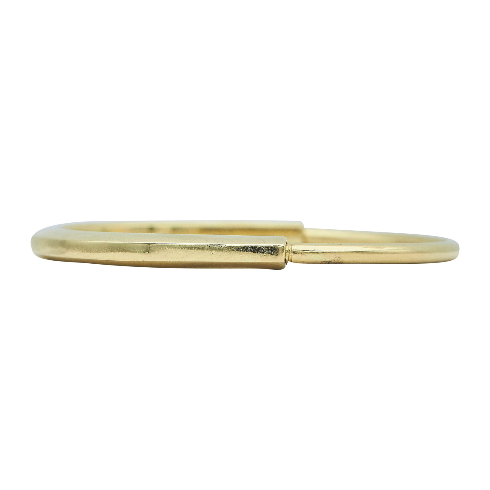 Tiffany & Co. Tiffany Lock 18K Yellow Gold Bracelet: BRAND: Tiffany & Co.; METAL: 18K Yellow Gold; STAMPED: © Tiffany & Co., Au 750, 19, Italy; CONDITION: Pre-owned, Good; ITEM WEIGHT (GRAMS): 14.7 g; MEASUREMENTS: Bracelet inner circumference approx. 