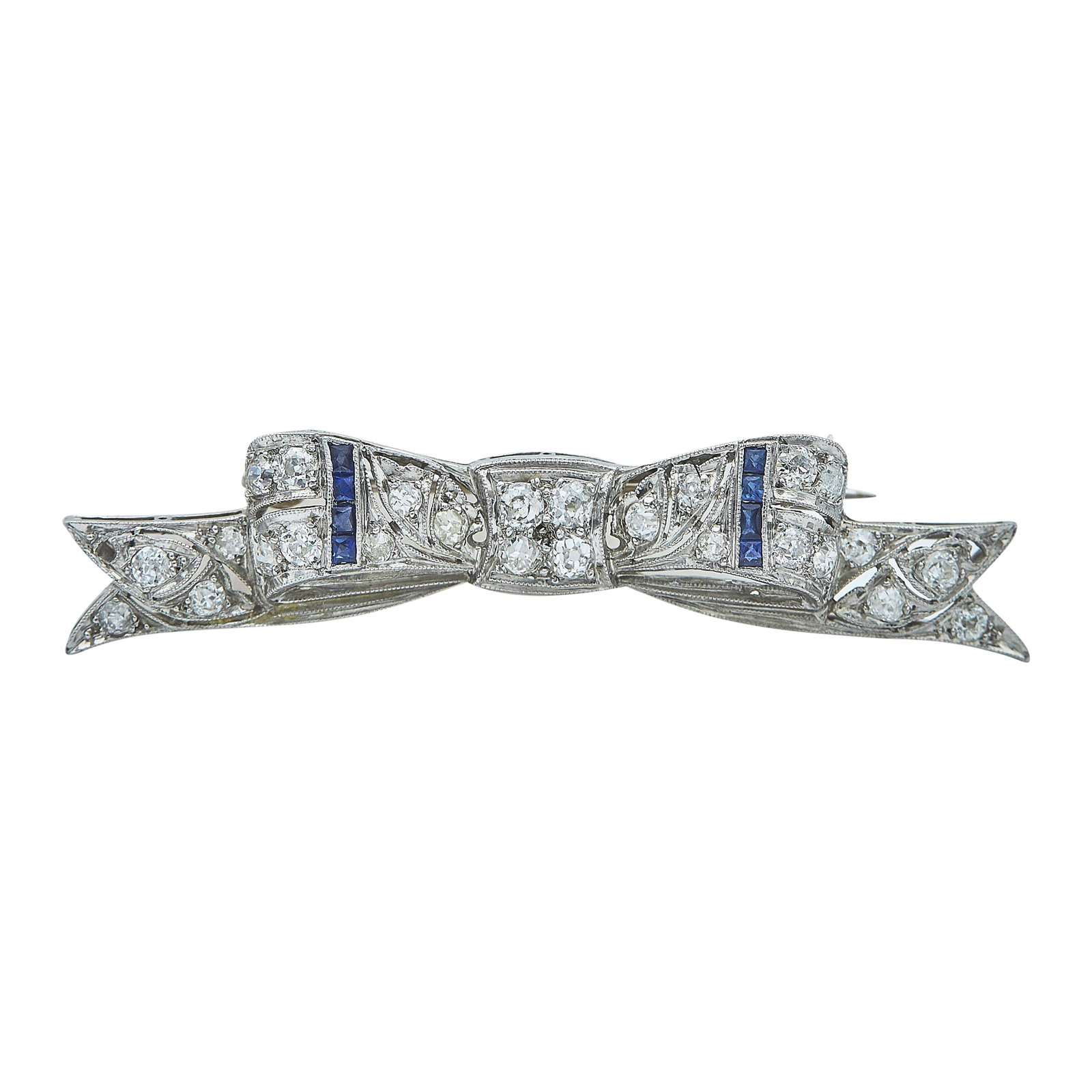 Art Deco Platinum Diamond and Sapphire Bow Pin Brooch: METAL: Platinum; APPROXIMATE TOTAL DIAMOND WEIGHT: 1 ctw; GEMSTONES: Sapphire; STAMPED: PLAT; CONDITION: Pre-owned, Very Good; ITEM WEIGHT (GRAMS): 6.2 g; MEASUREMENTS: Brooch 7/6 inch long x 2 inches
