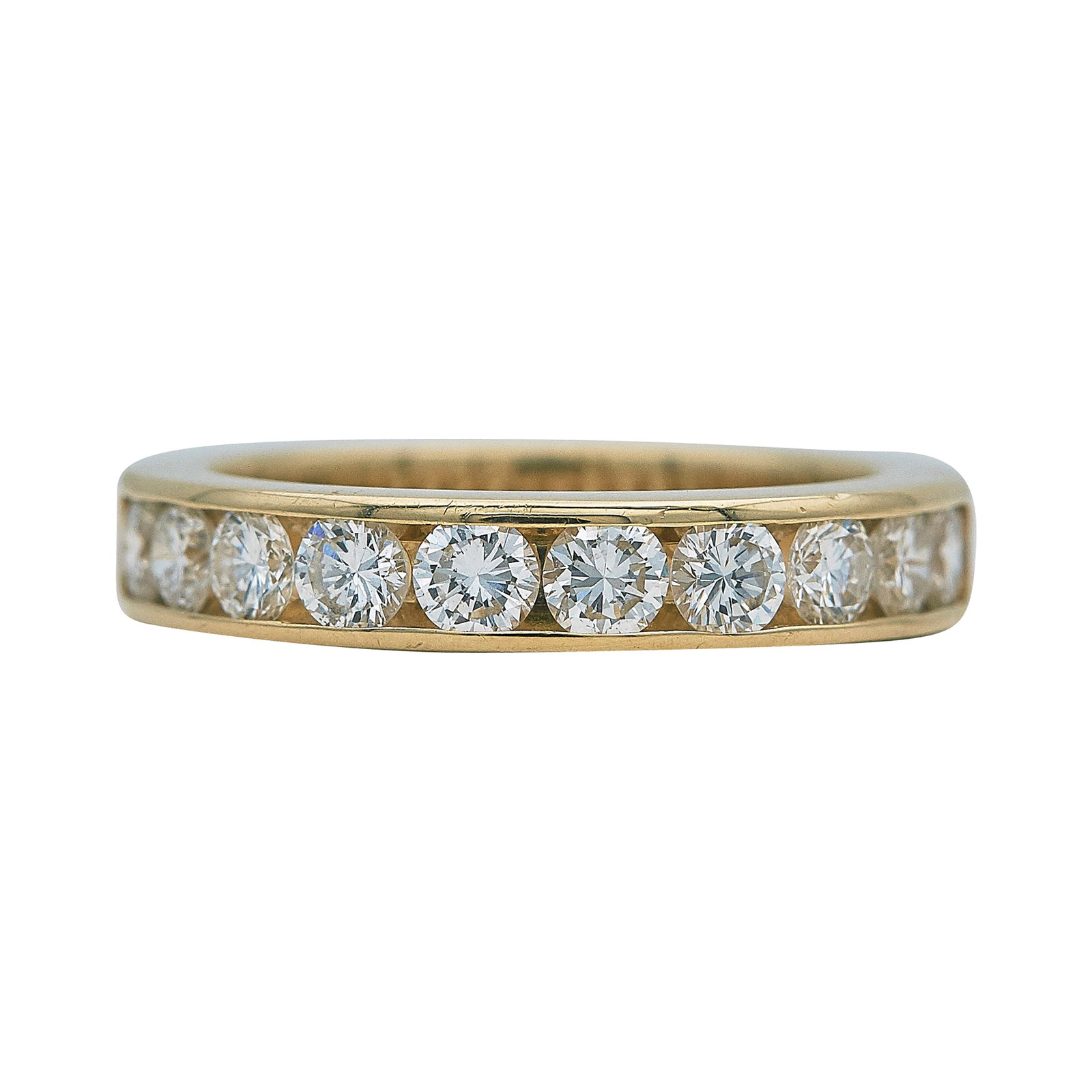 14K Yellow Gold and Diamond Band Ring: METAL: 14K Yellow Gold; APPROXIMATE TOTAL DIAMOND WEIGHT: 1 ctw; STAMPED: 14KP, Maker's mark; CONDITION: Pre-owned, Good; ITEM WEIGHT (GRAMS): 4.51 g; MEASUREMENTS: Ring size 6