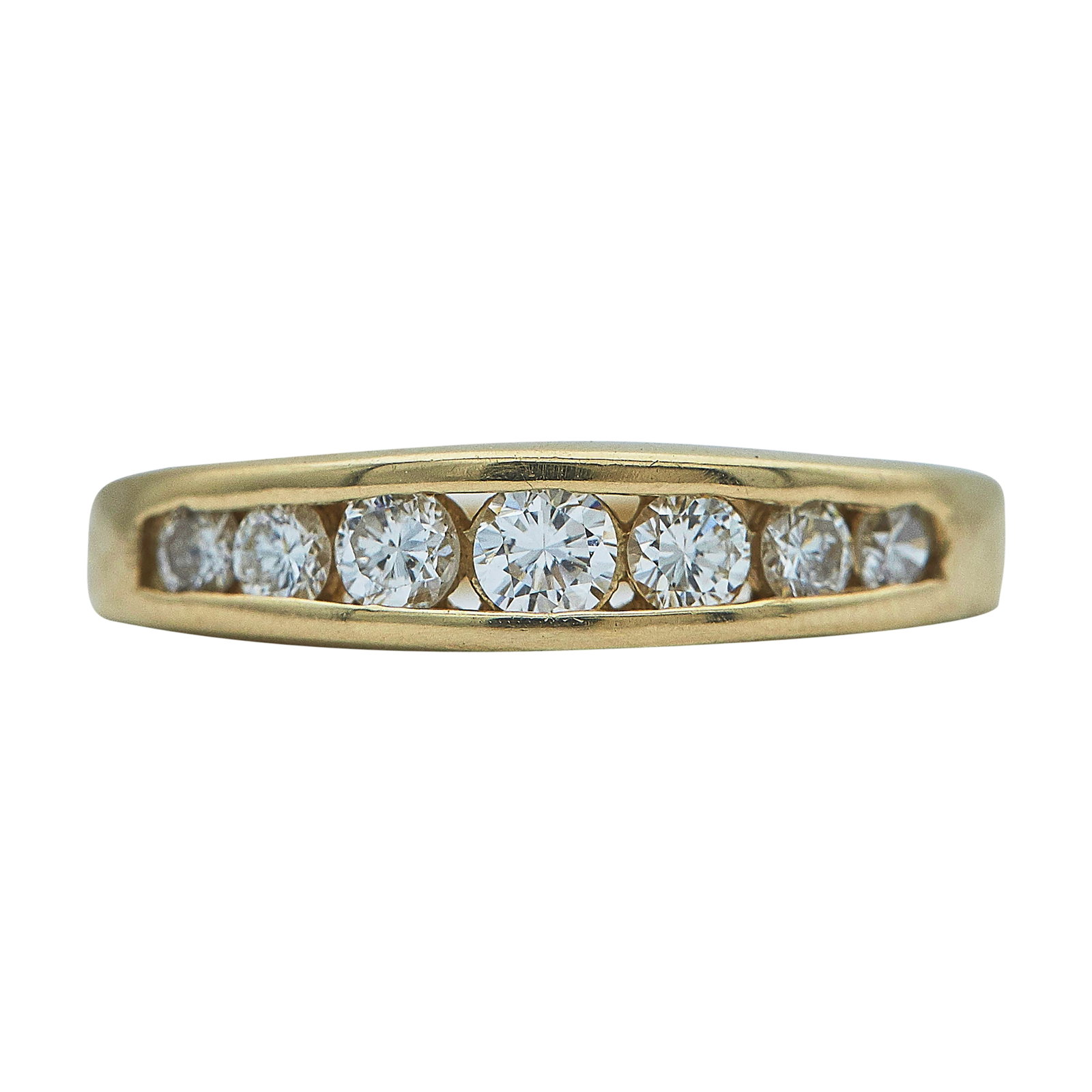 14K Yellow Gold Graduated Diamond Band Ring: METAL: 14K Yellow Gold; APPROXIMATE TOTAL DIAMOND WEIGHT: 0.50 ctw; STAMPED: 14K; CONDITION: Pre-owned, Good; ITEM WEIGHT (GRAMS): 2.92 g; MEASUREMENTS: Ring size 5