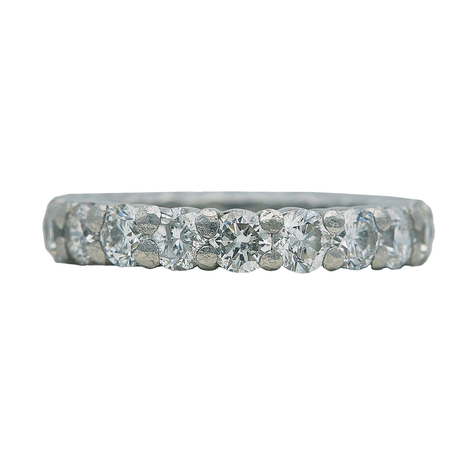 Platinum and Diamond Eternity Band Ring: METAL: Platinum; APPROXIMATE TOTAL DIAMOND WEIGHT: 3.50 ctw; STAMPED: Pt. 950; CONDITION: Pre-owned, Good; ITEM WEIGHT (GRAMS): 8.5 g; MEASUREMENTS: Ring size 6 1/2; ADDITIONAL COMMENTS: Several diamo