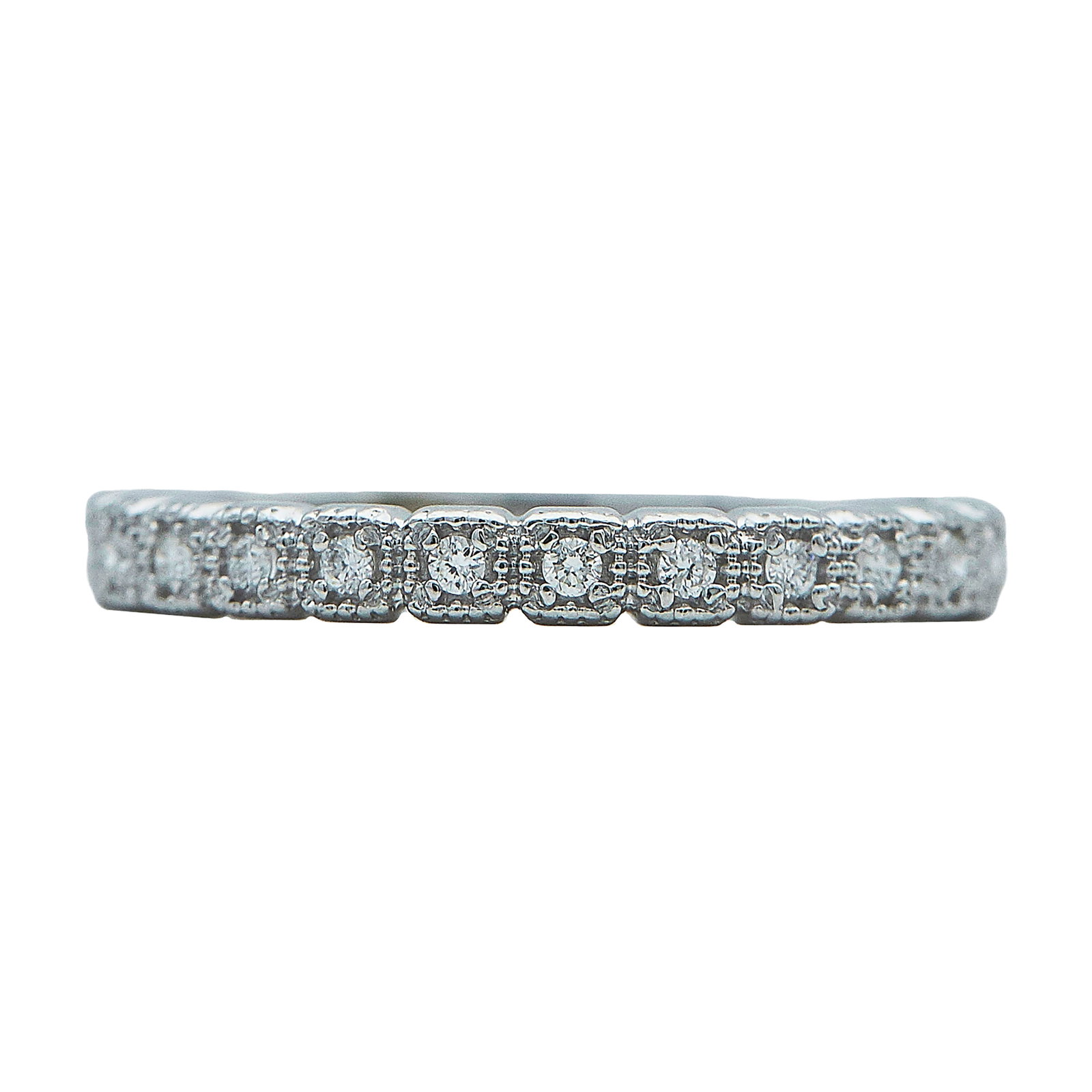 14K White Gold and Diamond Band Ring: METAL: 14K White Gold; APPROXIMATE TOTAL DIAMOND WEIGHT: 0.25 ctw; STAMPED: 14K, Maker's marks; CONDITION: Pre-owned, Very Good; ITEM WEIGHT (GRAMS): 1.8 g; MEASUREMENTS: Ring size 7