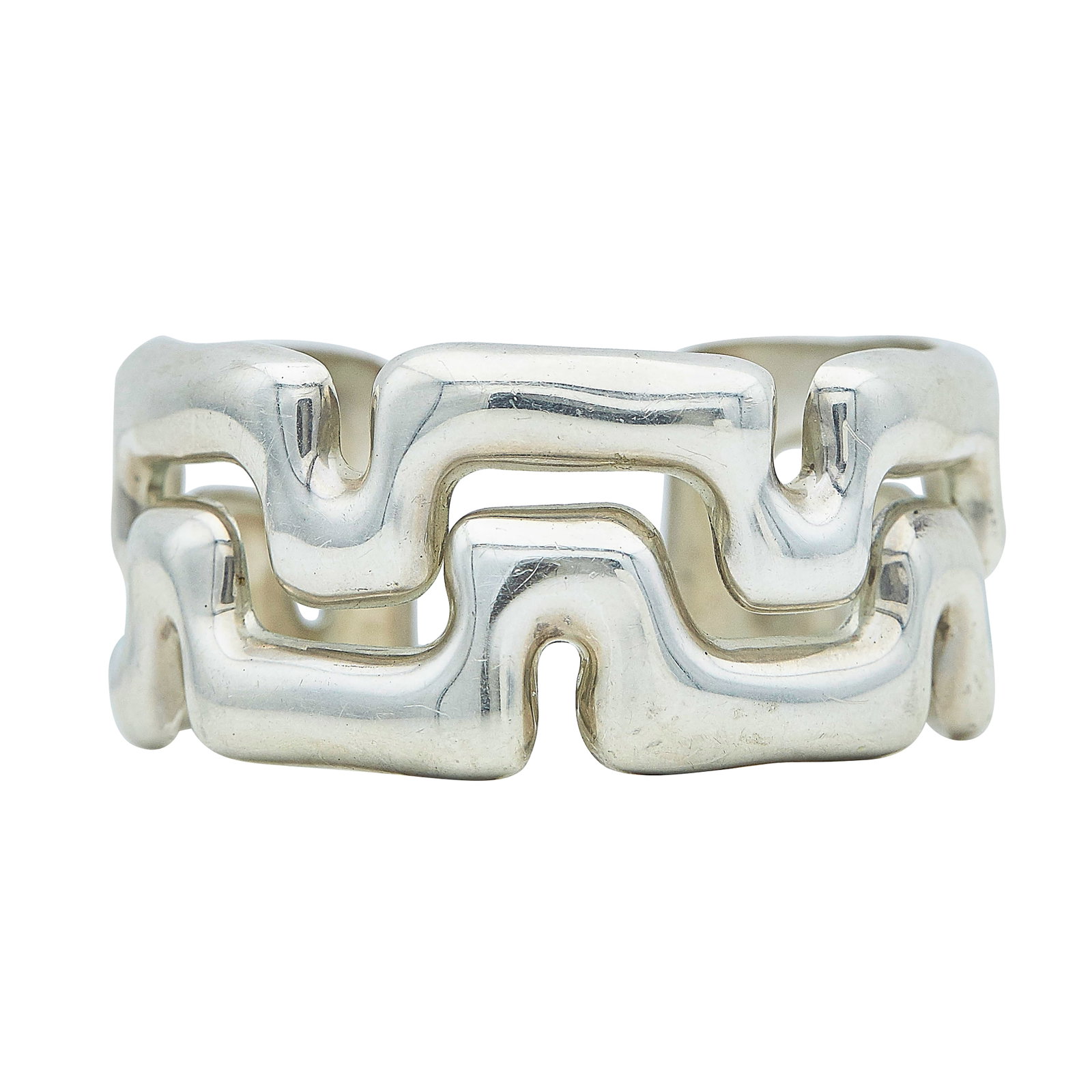 Tiffany & Co. Puzzle Sterling Silver Cuff Bracelet: BRAND: Tiffany & Co.; METAL: Sterling Silver; STAMPED: © Tiffany & Co. 925; CONDITION: Pre-owned, Good; ITEM WEIGHT (GRAMS): 41.6 g; MEASUREMENTS: Cuff approx. 6 inches in circumference