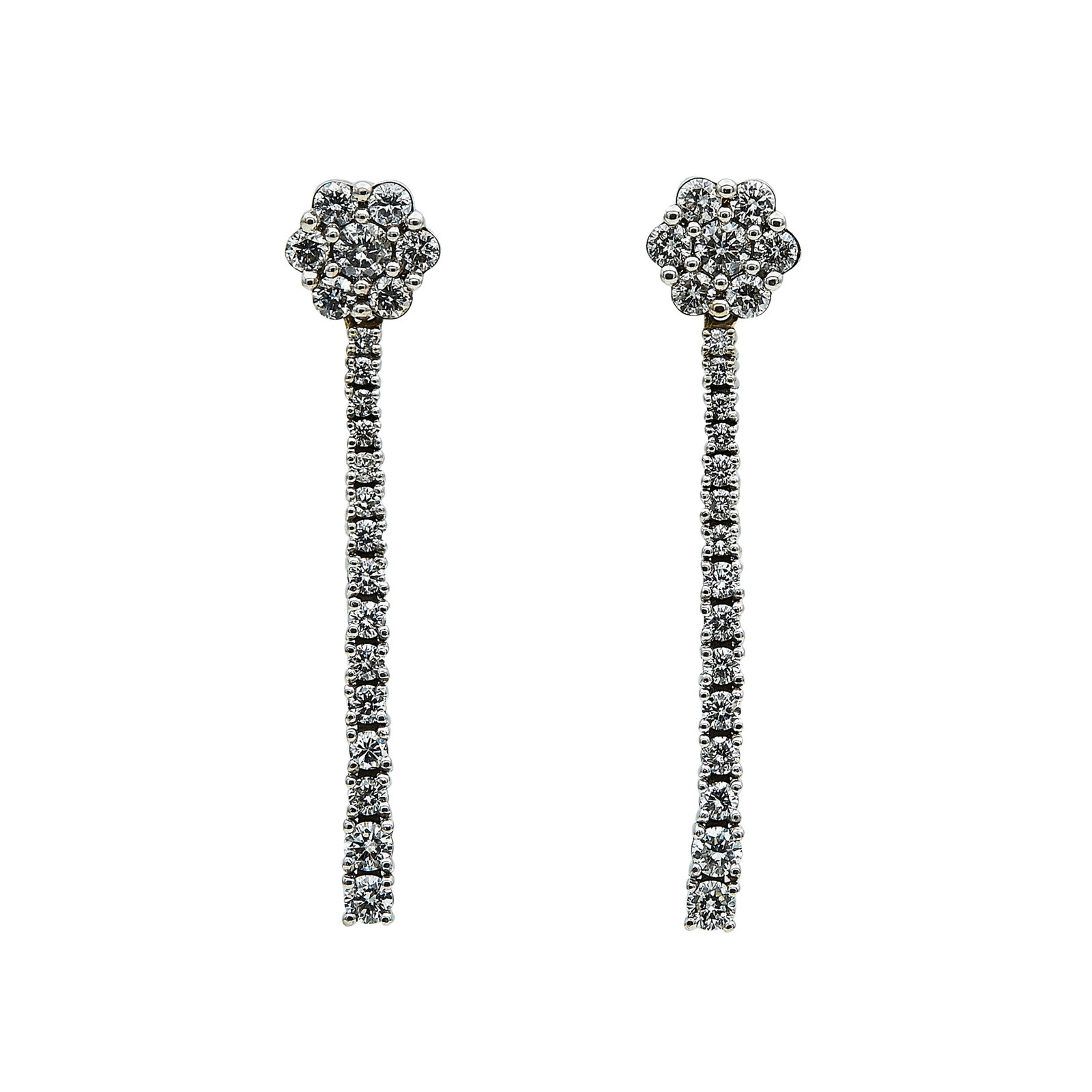 14K White Gold and Diamond Drop Earrings: METAL: 14K White Gold; APPROXIMATE TOTAL DIAMOND WEIGHT: 1.60 ctw; STAMPED: 14K; CONDITION: Pre-owned, Very Good; ITEM WEIGHT (GRAMS): 6.2 g; MEASUREMENTS: Earrings 1 5/8 inch long x 5/16 inch wide; A