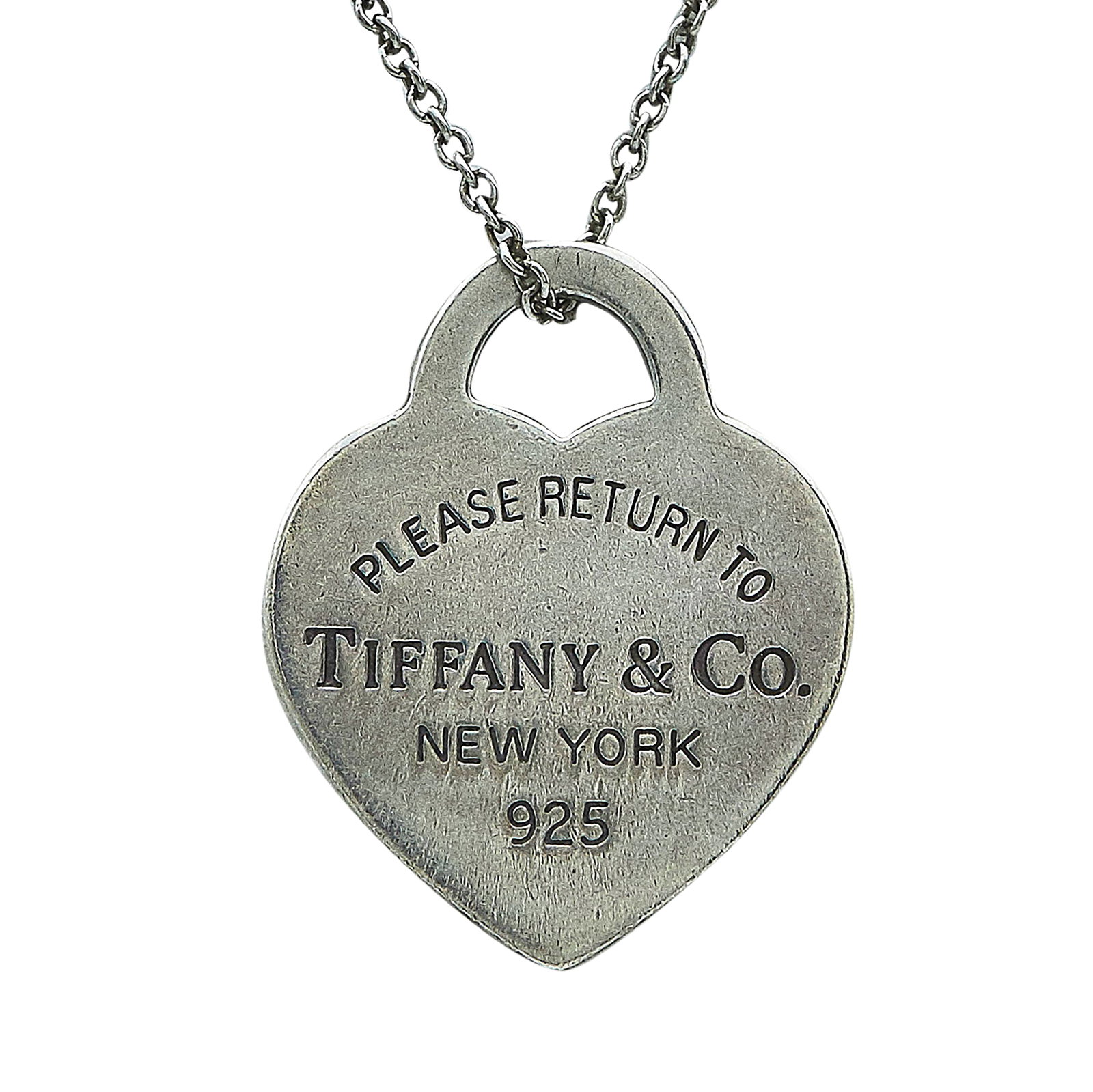Tiffany & Co. Return To Tiffany Sterling Silver Heart Pendant Necklace: BRAND: Tiffany & Co.; METAL: Sterling Silver; STAMPED: © Tiffany & Co., 925, Personal engraving; CONDITION: Pre-owned, Good; ITEM WEIGHT (GRAMS): 3.6 g; MEASUREMENTS: Necklace 16 inches long not incl