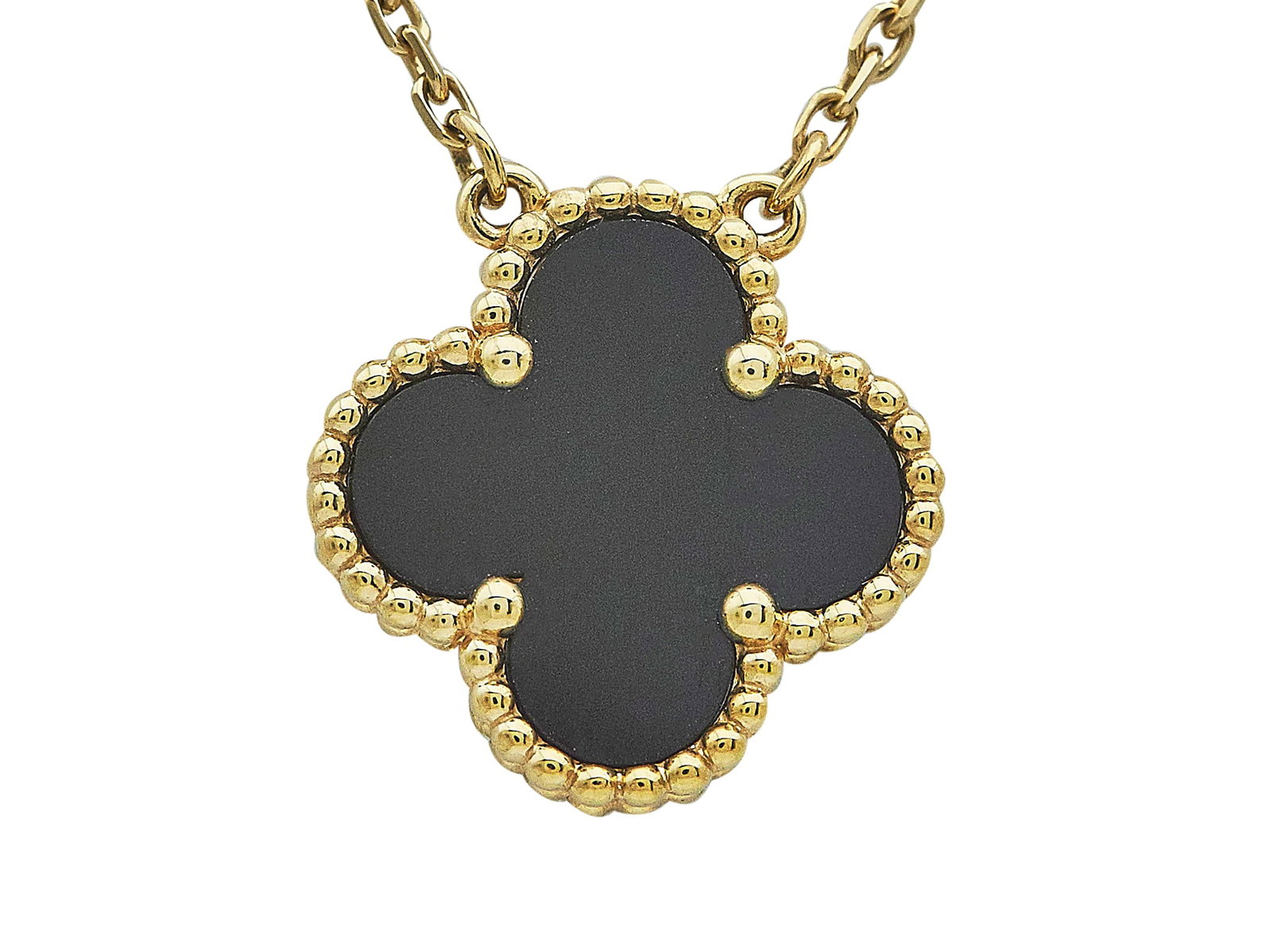 Van Cleef & Arpels Alhambra Vintage 18K Yellow Gold and Onyx Pendant Necklace: BRAND: VCA; COLLECTION: Alhambra (Vintage); METAL: 18K Yellow Gold; GEMSTONES: Onyx; STAMPED: VCA, Au750, Serial number, French marks; CONDITION: Pre-owned, Very Good; ITEM WEIGHT (GRAMS): 5.2 g; MEAS