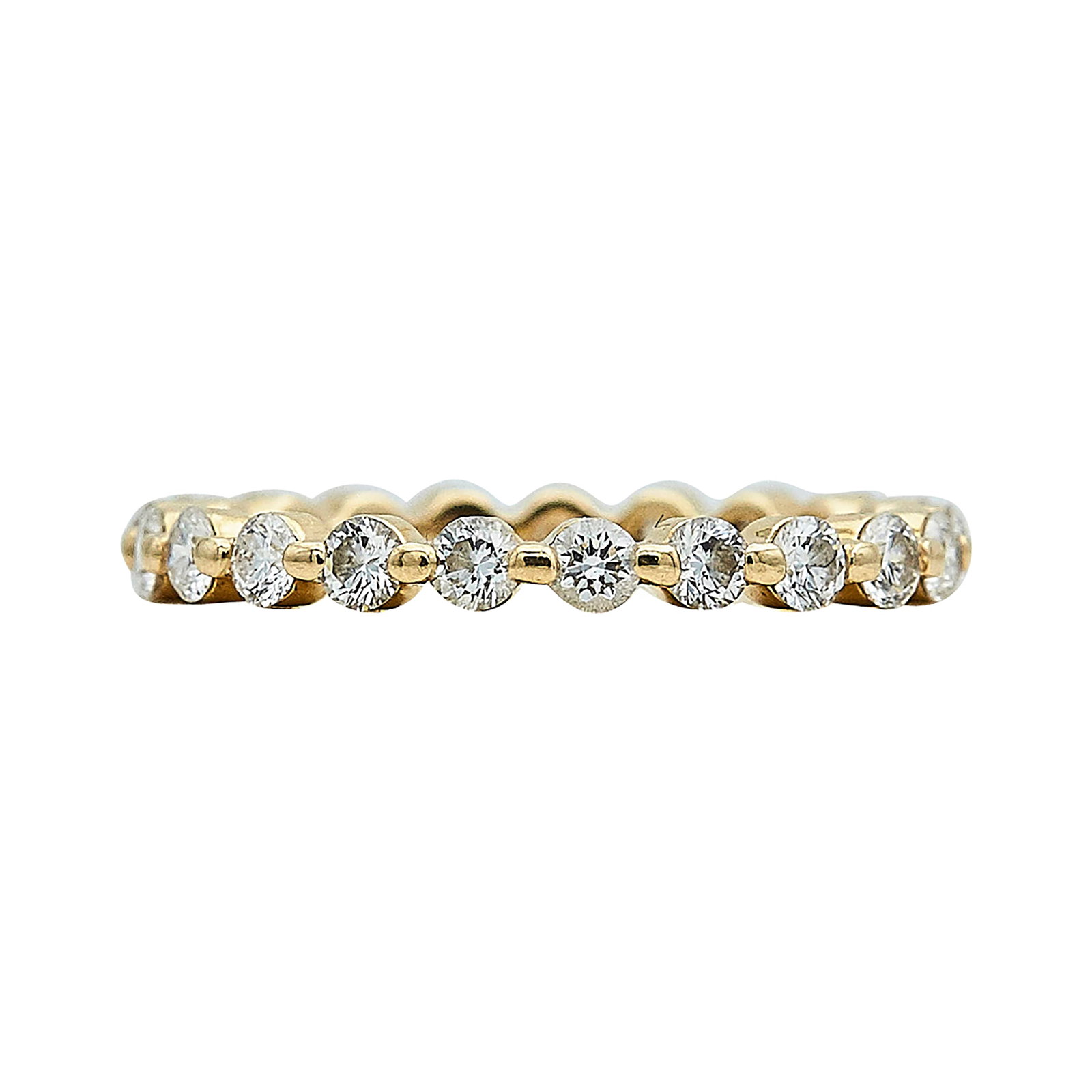 14K Yellow Gold and Diamond Eternity Band Ring: METAL: 14K Yellow Gold; APPROXIMATE TOTAL DIAMOND WEIGHT: 1 ctw; STAMPED: 14K, Unidentified brand mark; CONDITION: Pre-owned, Very Good; ITEM WEIGHT (GRAMS): 1.6 g; MEASUREMENTS: Ring size 5 1/4