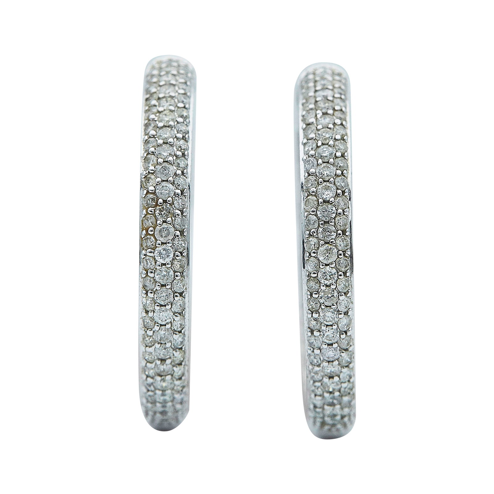 14K White Gold and Diamond Inside Out Hoop Earrings: METAL: 14K White Gold; APPROXIMATE TOTAL DIAMOND WEIGHT: 4.48 ctw; TESTED: 14K White Gold; CONDITION: Pre-owned, Very Good; ITEM WEIGHT (GRAMS): 14.4 g; MEASUREMENTS: Earrings 1 3/8 inch in diameter; 
