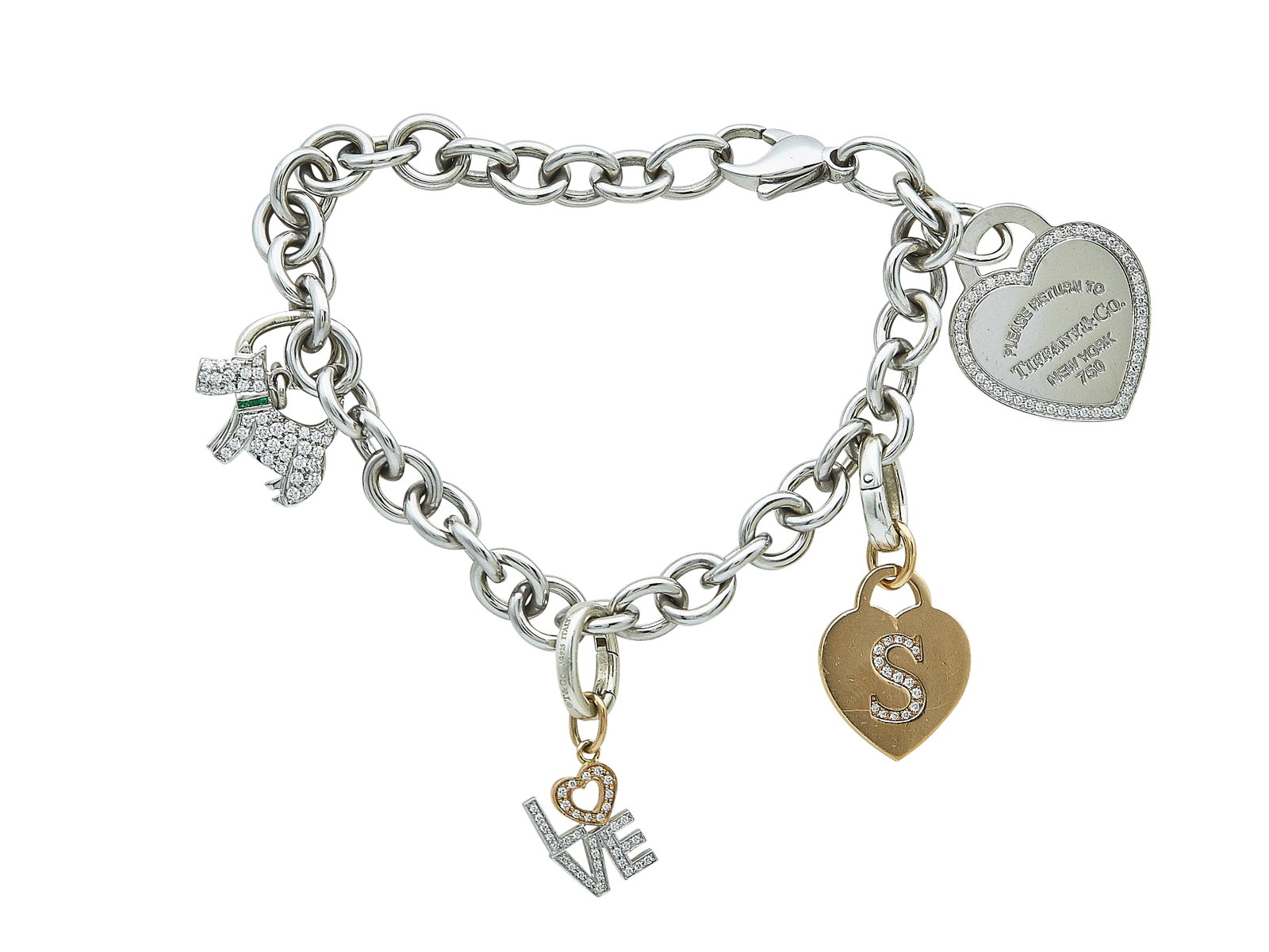 Tiffany & Co. Return To Tiffany 18K White & Rose Gold Diamond Charm Bracelet: BRAND: Tiffany & Co.; COLLECTION: Return To Tiffany; METAL: 18K White Gold, 18K Rose Gold; APPROXIMATE TOTAL DIAMOND WEIGHT: 1.20 ctw; GEMSTONES: Emerald; STAMPED: RTT bracelet marked: 18K, © Tiffany