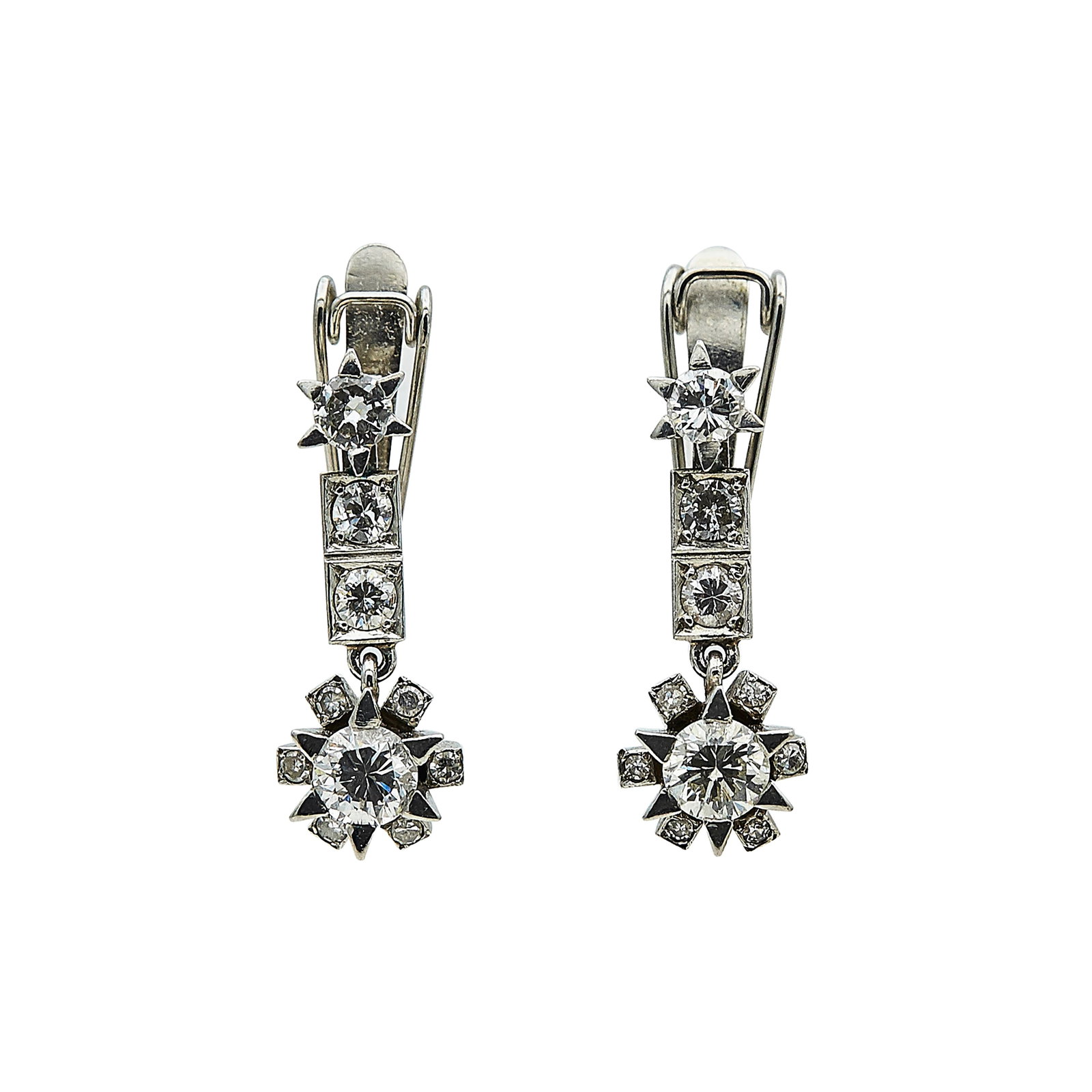 Platinum and Diamond Star Drop Earrings: METAL: Platinum; APPROXIMATE TOTAL DIAMOND WEIGHT: 2.36 ctw; TESTED: Platinum; CONDITION: Pre-owned, Very Good; ITEM WEIGHT (GRAMS): 10.4 g; MEASUREMENTS: Earrings 1 inch long x 3/8 inch wide; ADDITIO