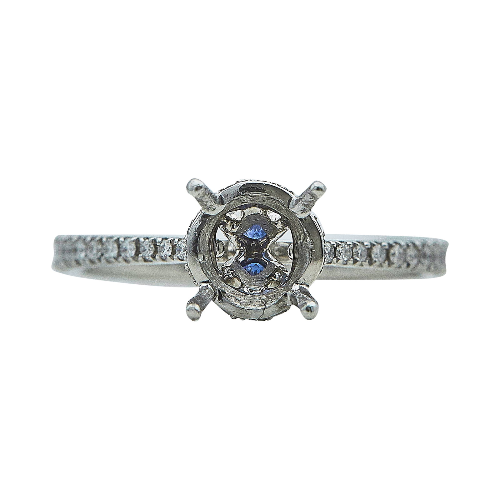 Platinum, Diamond, and Sapphire Engagement Ring Setting: METAL: Platinum; APPROXIMATE TOTAL DIAMOND WEIGHT: 0.20 ctw; GEMSTONES: Sapphire; TESTED: Platinum; CONDITION: Pre-owned, Good; ITEM WEIGHT (GRAMS): 2.9 g; MEASUREMENTS: Ring size 6 1/2, Center will f