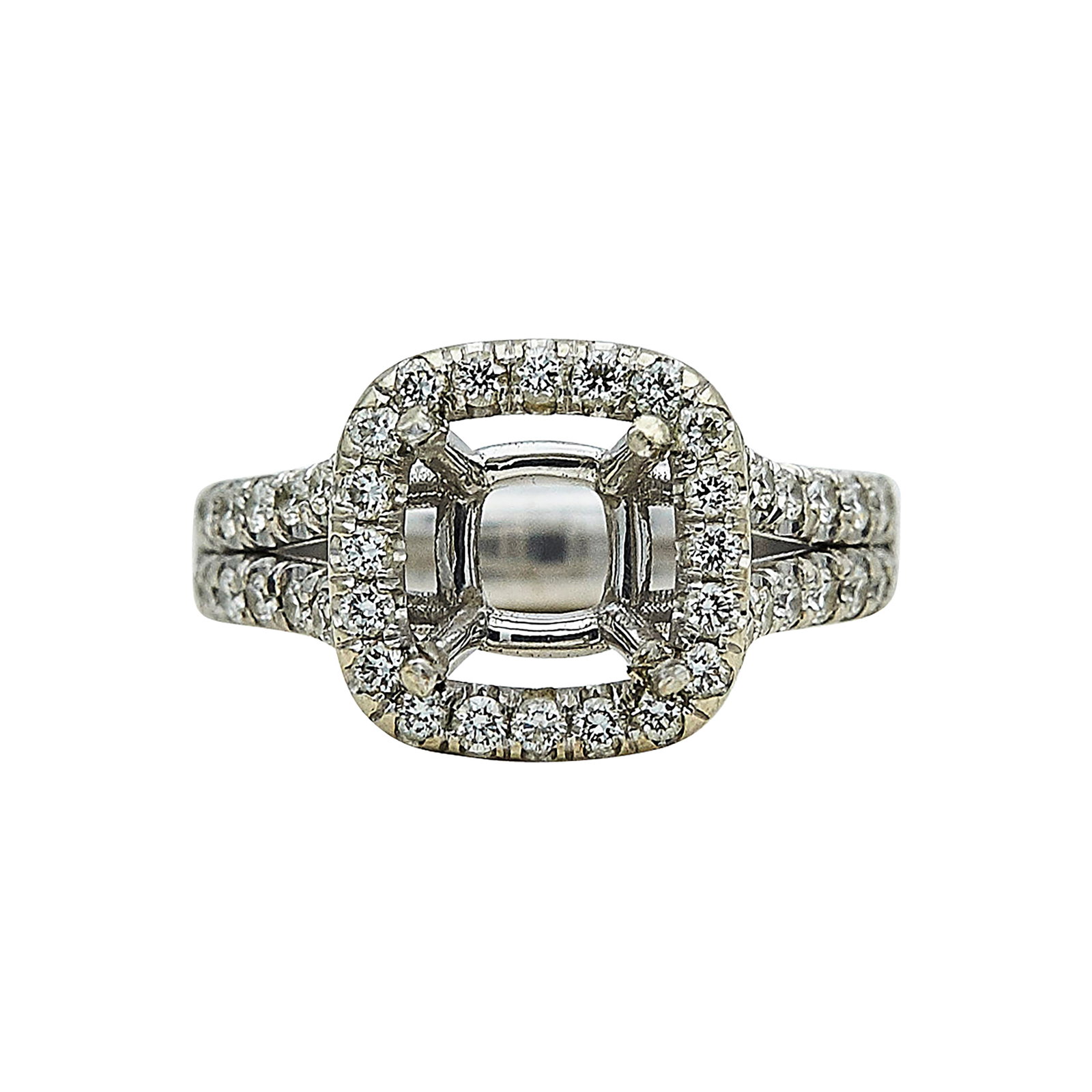 14K White Gold and Diamond Halo Engagement Ring Setting: METAL: 14K White Gold; APPROXIMATE TOTAL DIAMOND WEIGHT: 0.70 ctw; STAMPED: 14K; CONDITION: Pre-owned, Good; ITEM WEIGHT (GRAMS): 6 g; MEASUREMENTS: Ring size 5 1/2, Center will fit approx. 9.39 mm ro