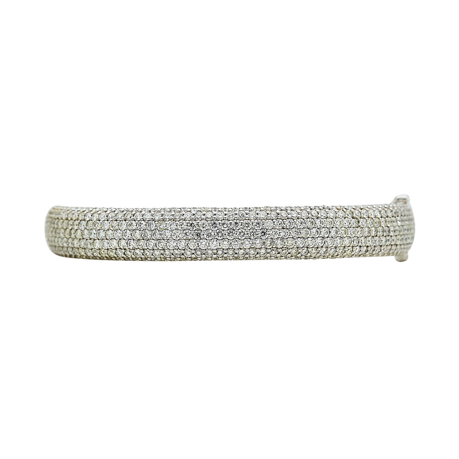 14K White Gold and Diamond Demi-Pave Bangle Bracelet: METAL: 14K White Gold; APPROXIMATE TOTAL DIAMOND WEIGHT: 7 ctw; STAMPED: 14K; CONDITION: Pre-owned, Very Good; ITEM WEIGHT (GRAMS): 26.1 g; MEASUREMENTS: Bracelet inner circumference approx. 6 1/2 inc