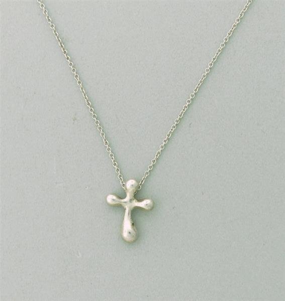Vintage Tiffany & Co Peretti Sterling Cross Pendant: Measurements- length of necklace 17", 15.5 x 12mm cross only, weight- 2.6 g, marks- T & Co. 925 Peretti, consignor- sb