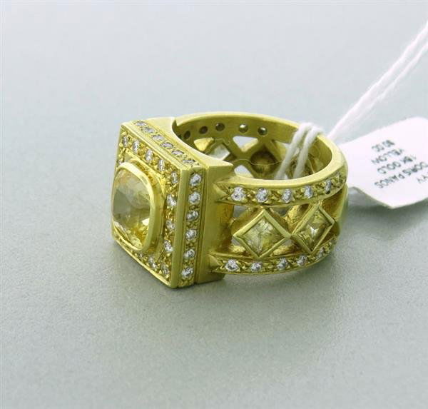 Doris Panos 18k Gold Yellow Sapphire Diamond Ring: Measurements - ring size - 6 1/2, ring to is 14mm wide. diamonds - approx. 0.40ctw. yellow sapphires - center approx. 2.75ct,side sapphires approx.1.00ctw. marked - 2000,DP,18k. weight - 16.6g con# sb