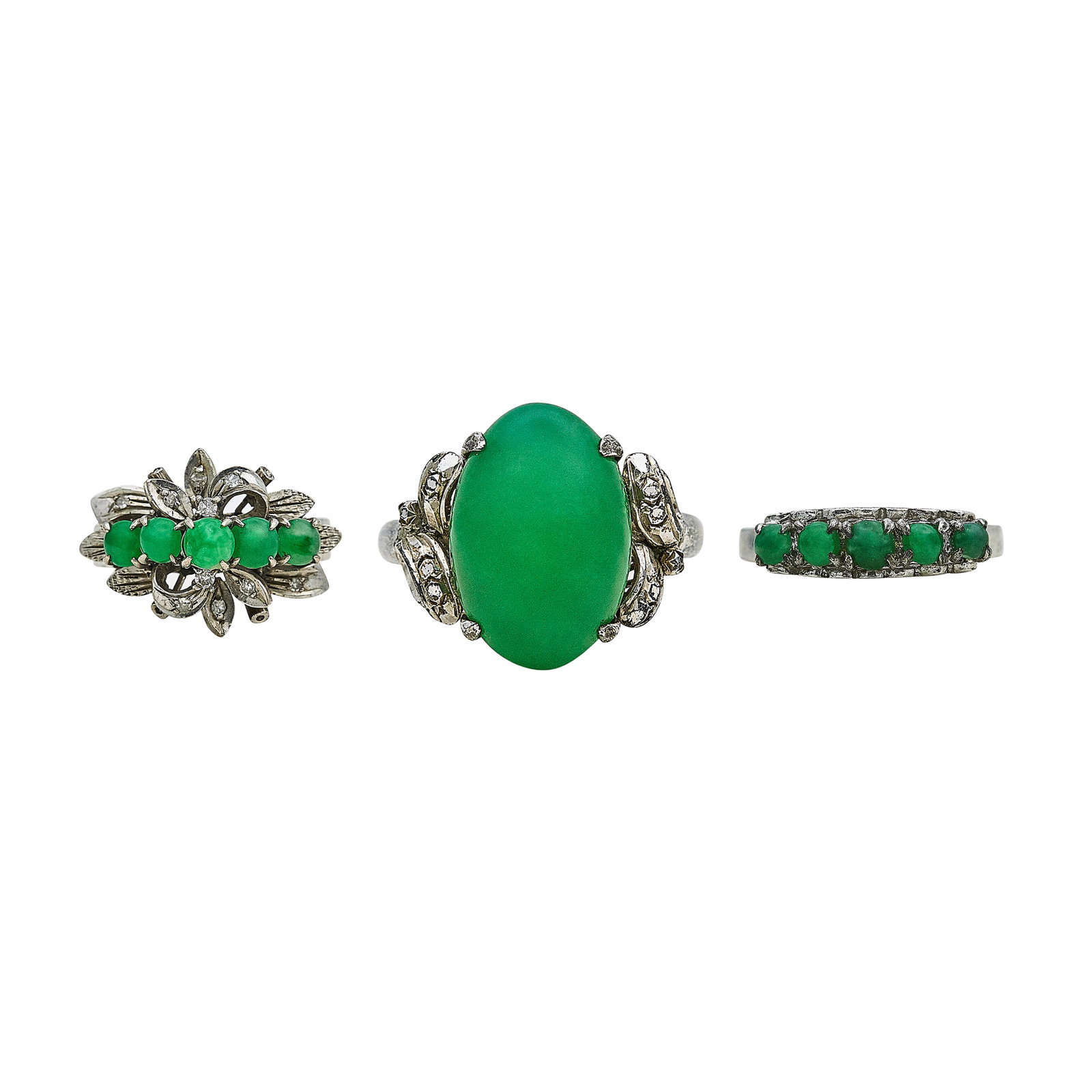 Silver, Base Metal, and Jadeite Ring Lot: METAL: Silver, Base Metal; GEMSTONES: Jadeite; TESTED: Silver, Base Metal; CONDITION: Pre-owned, Good; ITEM WEIGHT (GRAMS): 10.6 g; MEASUREMENTS: Ring 1: Size 6 1/2Ring 2: Size 4 1/2Ring 3: Size 5 3/4
