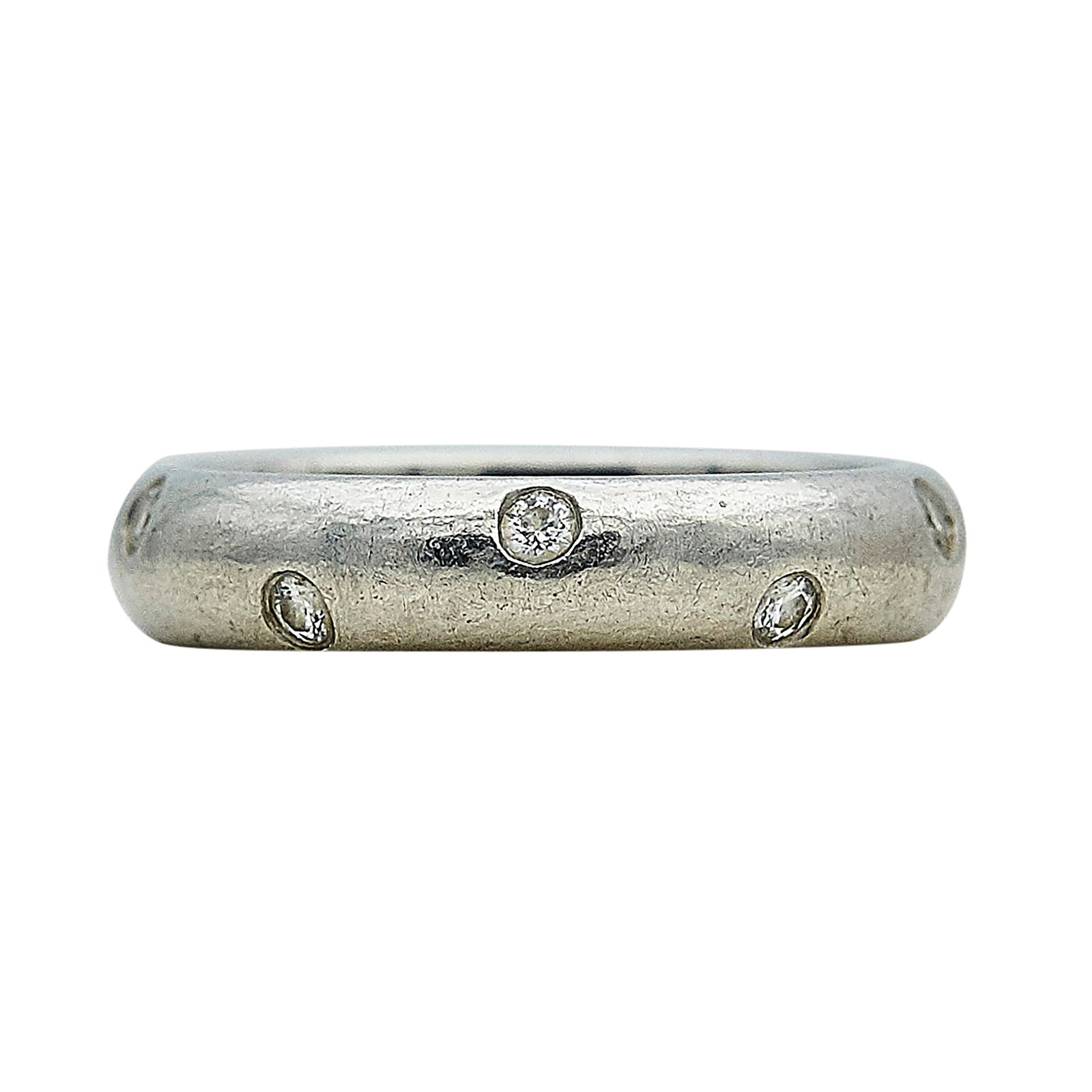 Tiffany & Co. Platinum and Diamond Band Ring: BRAND: Tiffany & Co.; METAL: Platinum; APPROXIMATE TOTAL DIAMOND WEIGHT: 0.20 ctw; STAMPED: T & Co., PT 950; CONDITION: Pre-owned, Good; ITEM WEIGHT (GRAMS): 7.4 g; MEASUREMENTS: Ring size 6