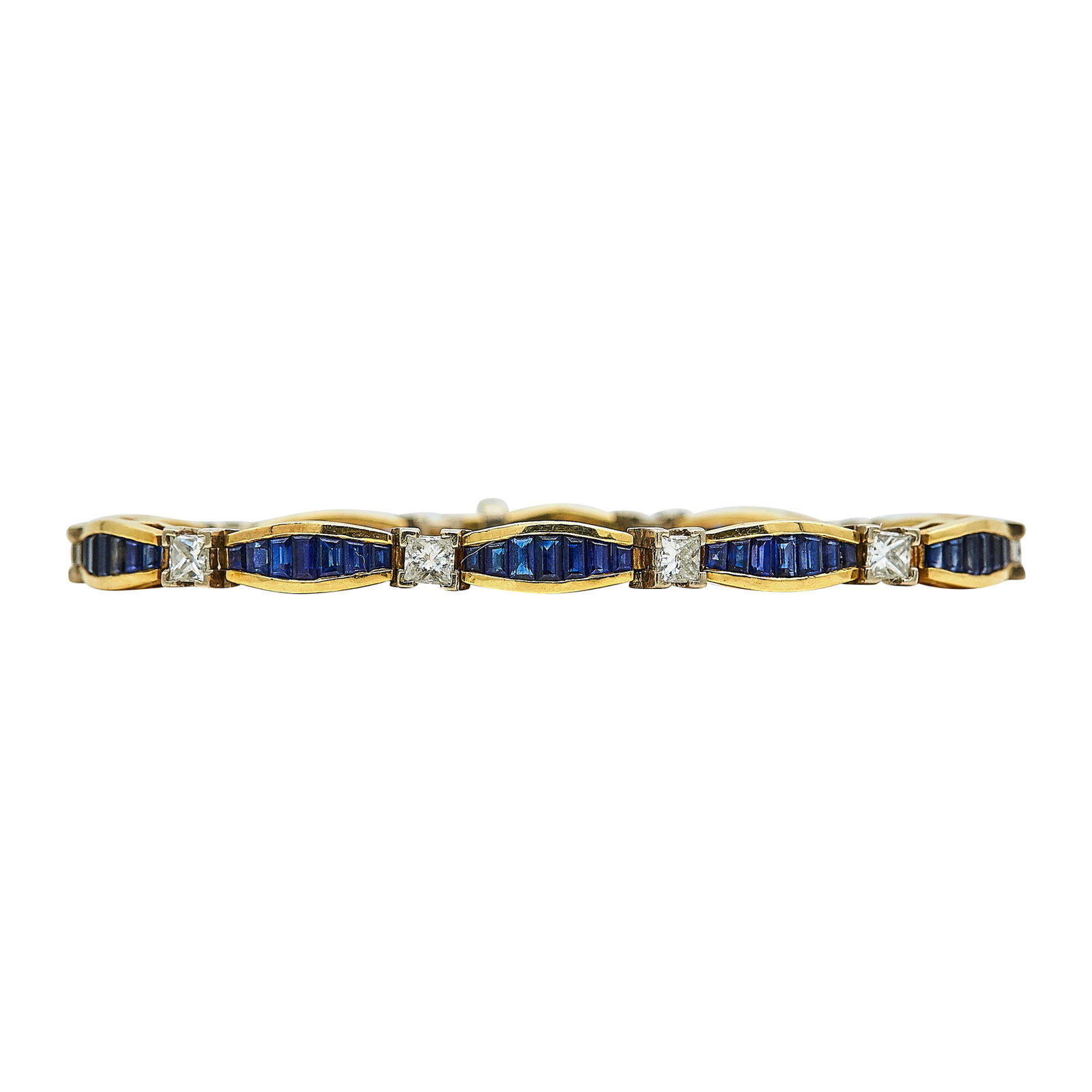 18K Yellow & White Gold, Sapphire, and Diamond Link Bracelet: METAL: 18K Yellow Gold/White Gold; APPROXIMATE TOTAL DIAMOND WEIGHT: 2.50 ctw; GEMSTONES: Sapphire; STAMPED: K18; CONDITION: Pre-owned, Very Good; ITEM WEIGHT (GRAMS): 22.7 g; MEASUREMENTS: Bracelet 7