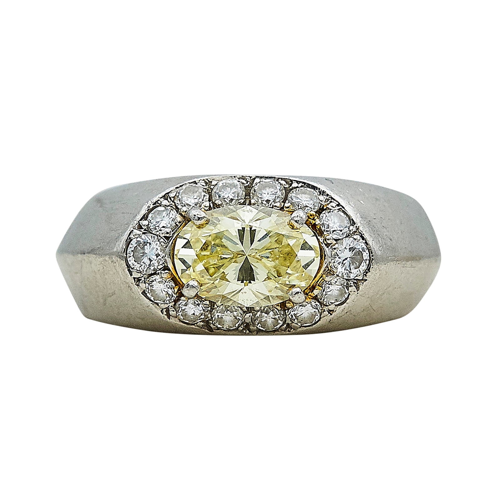 Platinum and Diamond Signet Ring: METAL: Platinum; APPROXIMATE TOTAL DIAMOND WEIGHT: 0.95 ctw; STAMPED: Maker's mark, Pt., Rubbed mark; CONDITION: Pre-owned, Good; ITEM WEIGHT (GRAMS): 7.3 g; MEASUREMENTS: Ring size 4 14