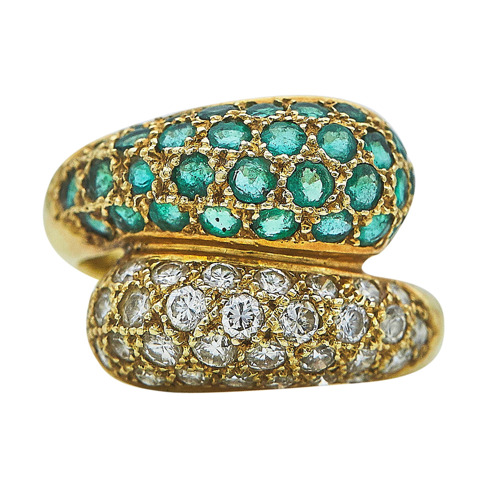 18K Yellow Gold, Diamond, and Emerald Crossover Ring: METAL: 18K Yellow Gold; APPROXIMATE TOTAL DIAMOND WEIGHT: 0.62 ctw; GEMSTONES: Emerald; STAMPED: 18K, Personal engraving; CONDITION: Pre-owned, Very Good; ITEM WEIGHT (GRAMS): 6 g; MEASUREMENTS: Ring 
